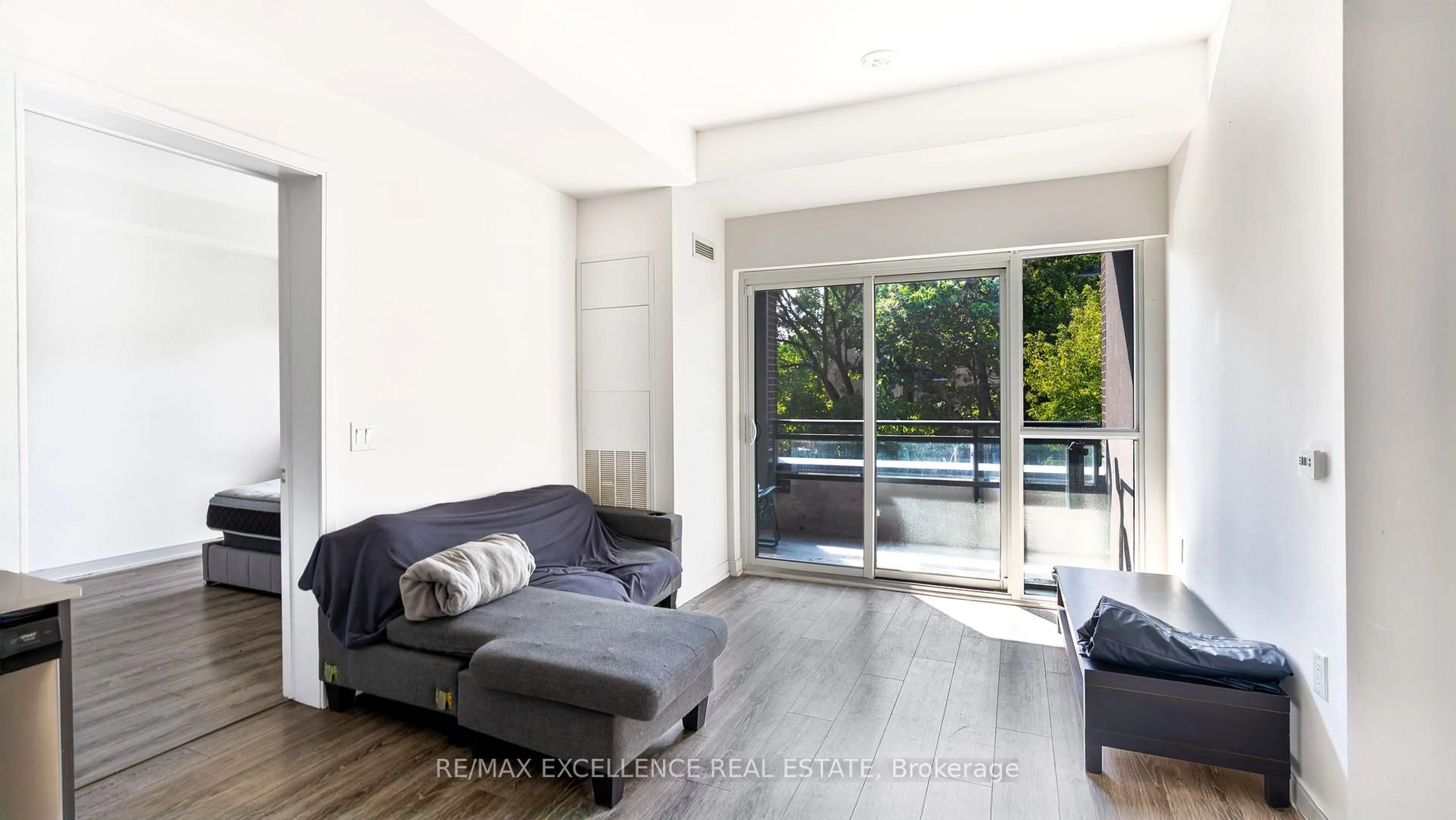Living room with furniture, unknown for 25 Neighbourhood Lane #507, Toronto Ontario M8Y 0C4
