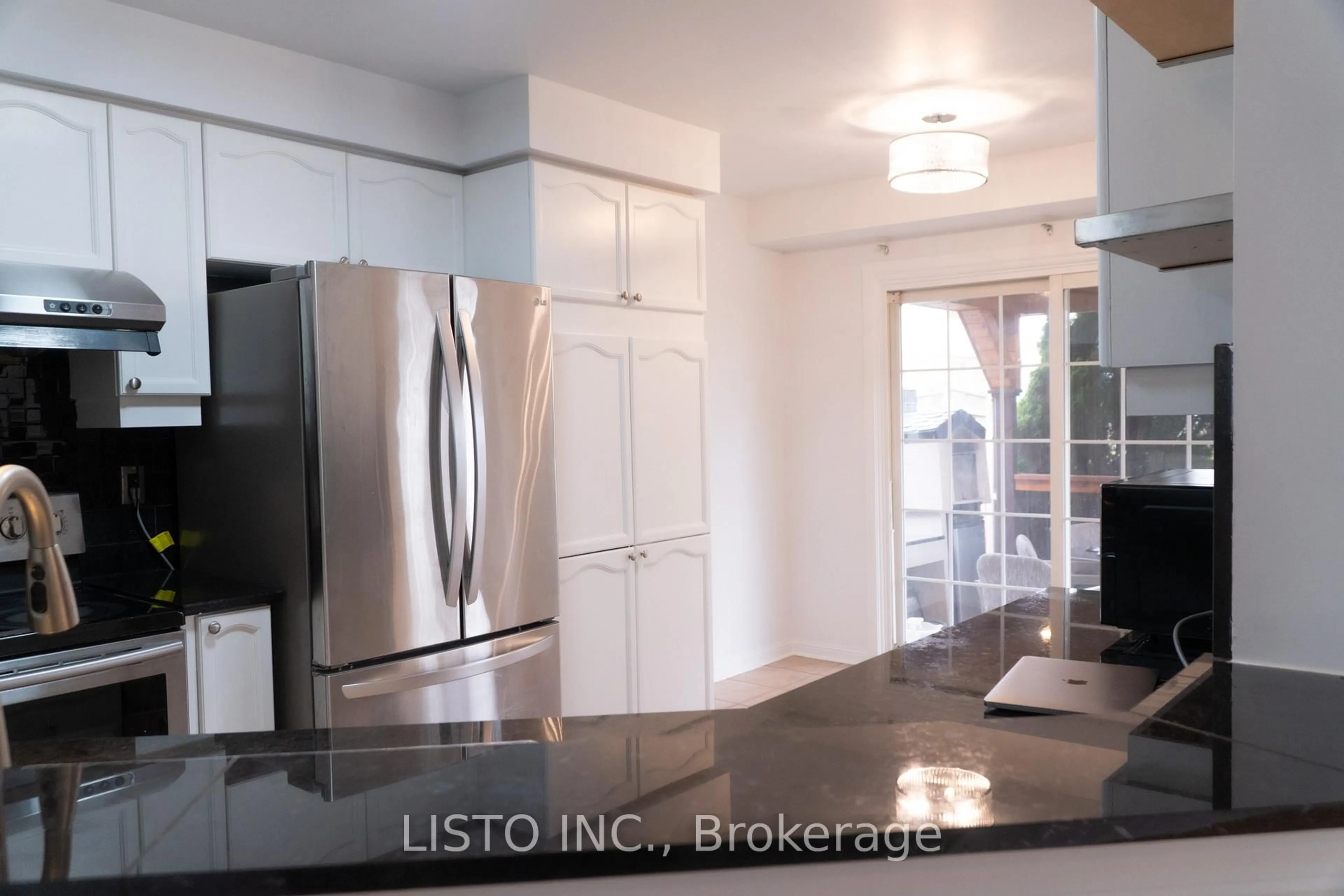 Open concept kitchen, ceramic/tile floor for 128 Sweetwood Circ, Brampton Ontario L7A 2S2
