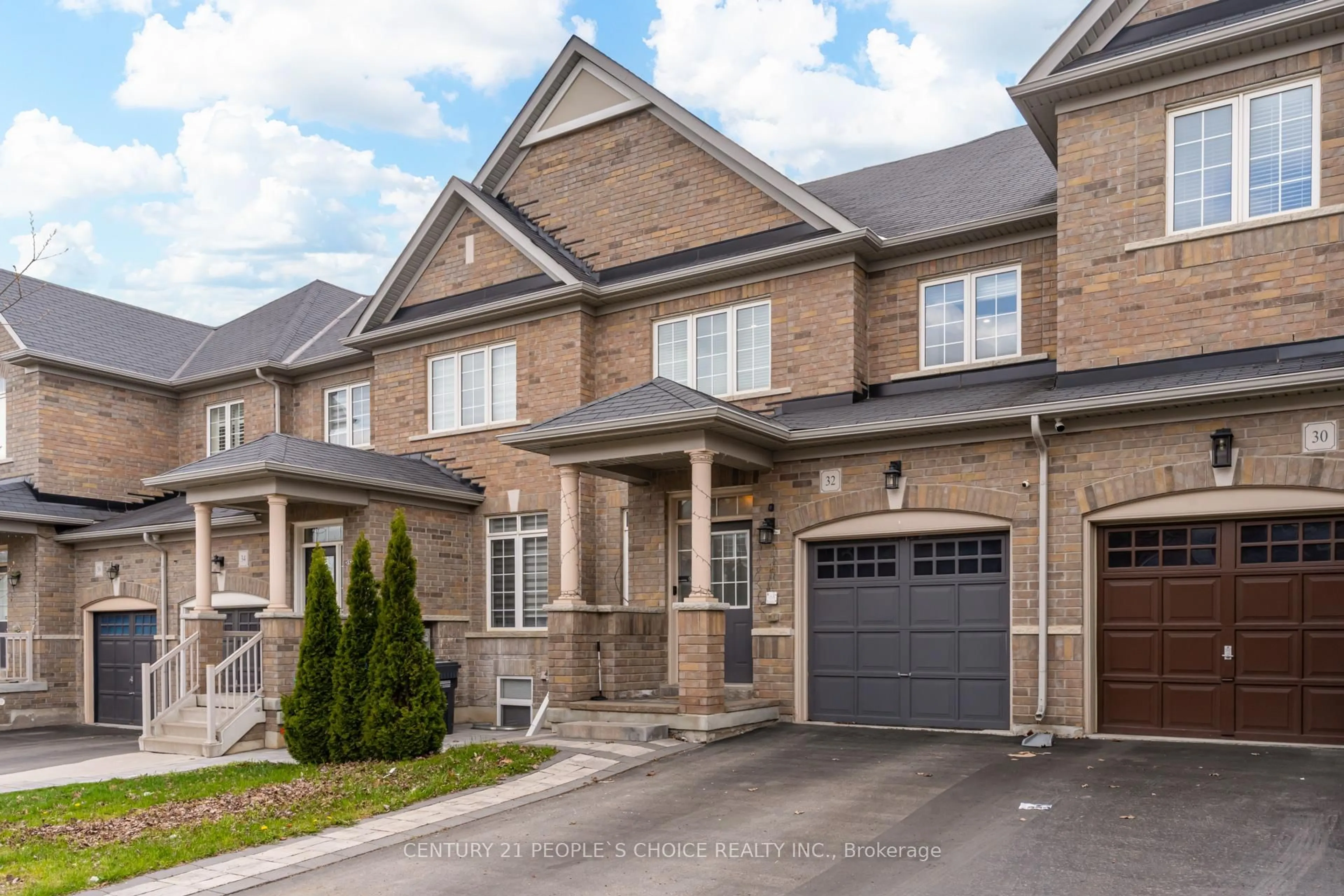 Home with brick exterior material, street for 32 Yellow Sorrel Rd, Brampton Ontario L6R 0B6