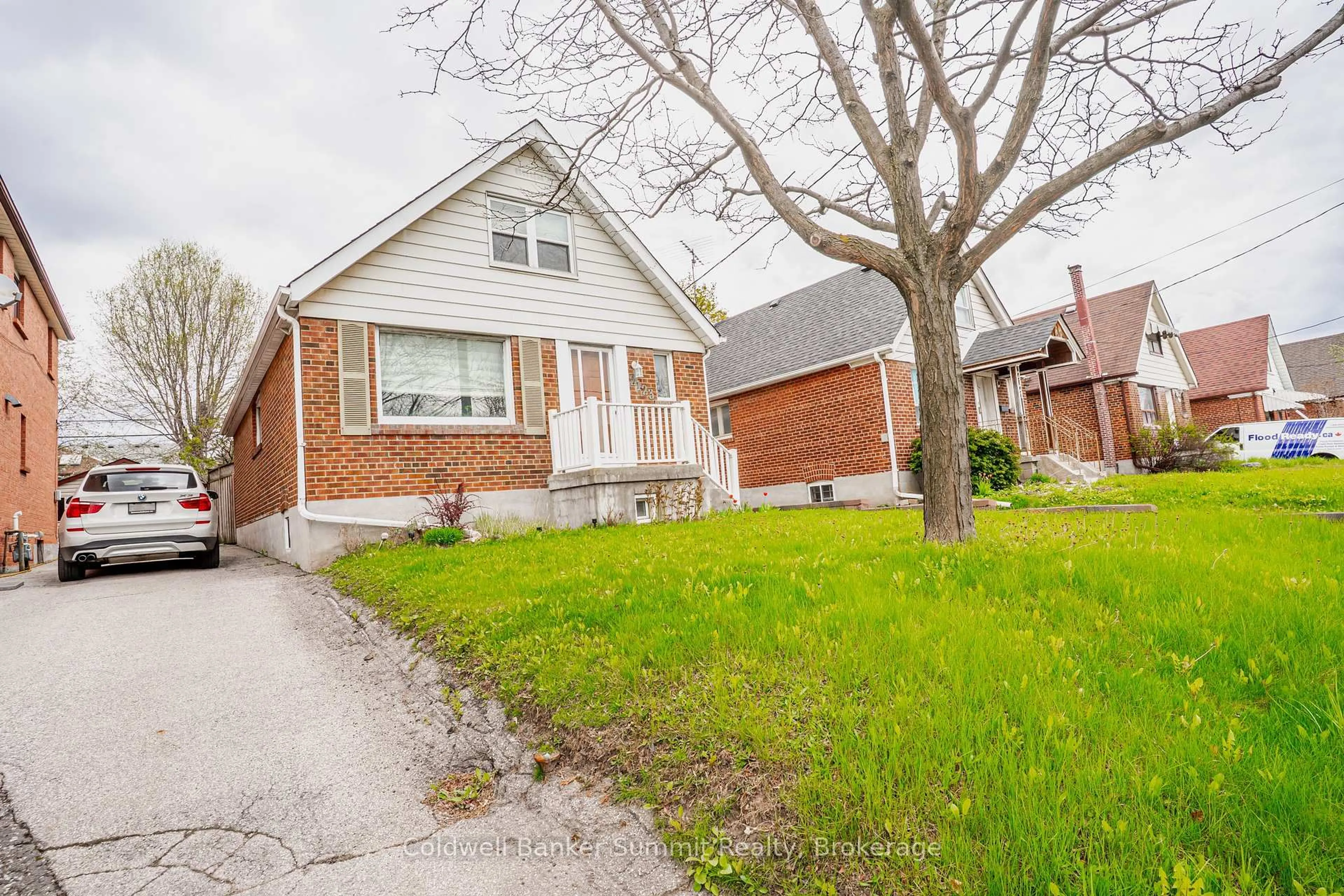 Home with brick exterior material, street for 2123 Keele St, Toronto Ontario M6M 3Z3