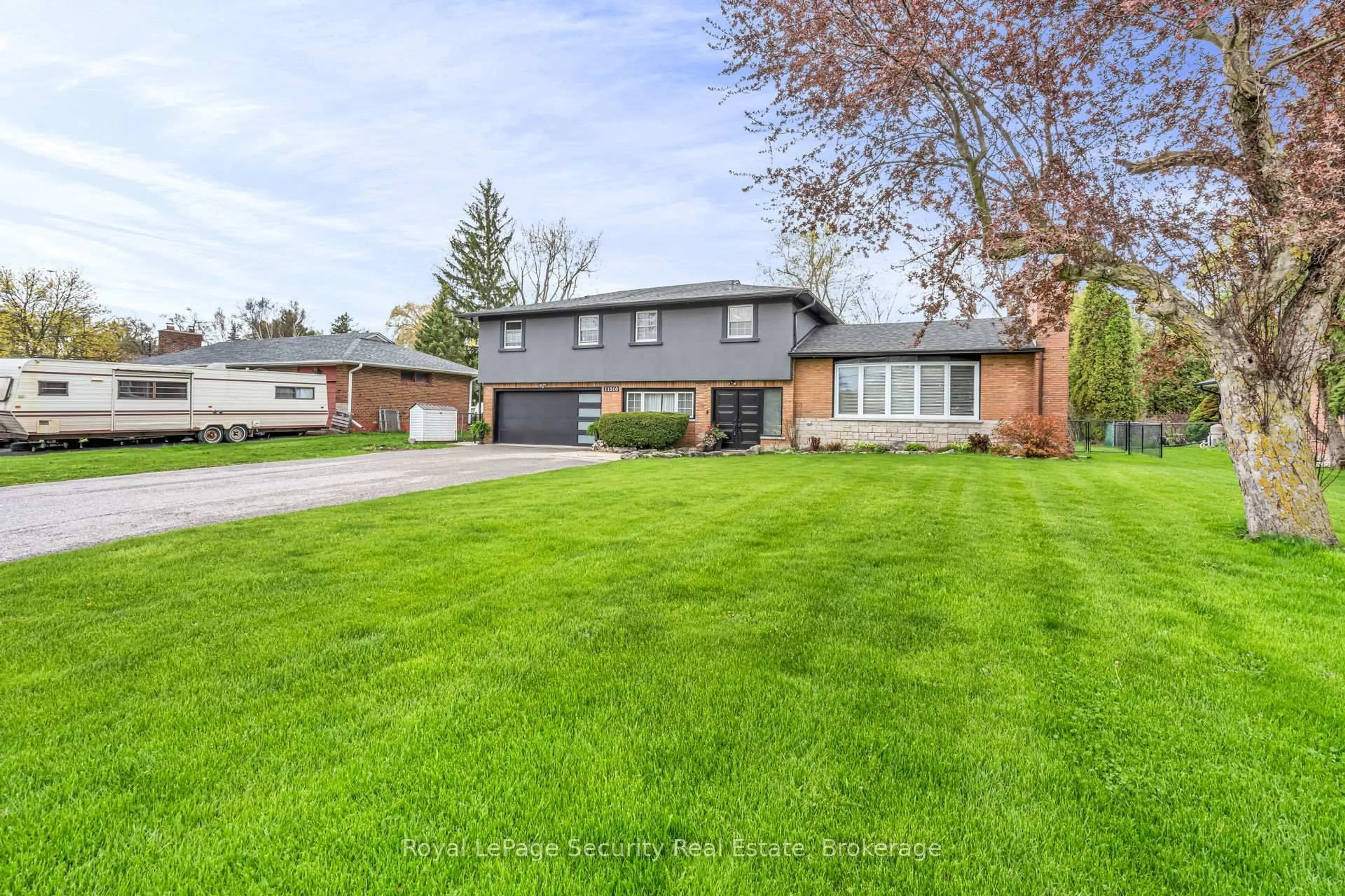 Home with vinyl exterior material, street for 11310 Trafalgar Rd, Halton Hills Ontario L7G 4S5