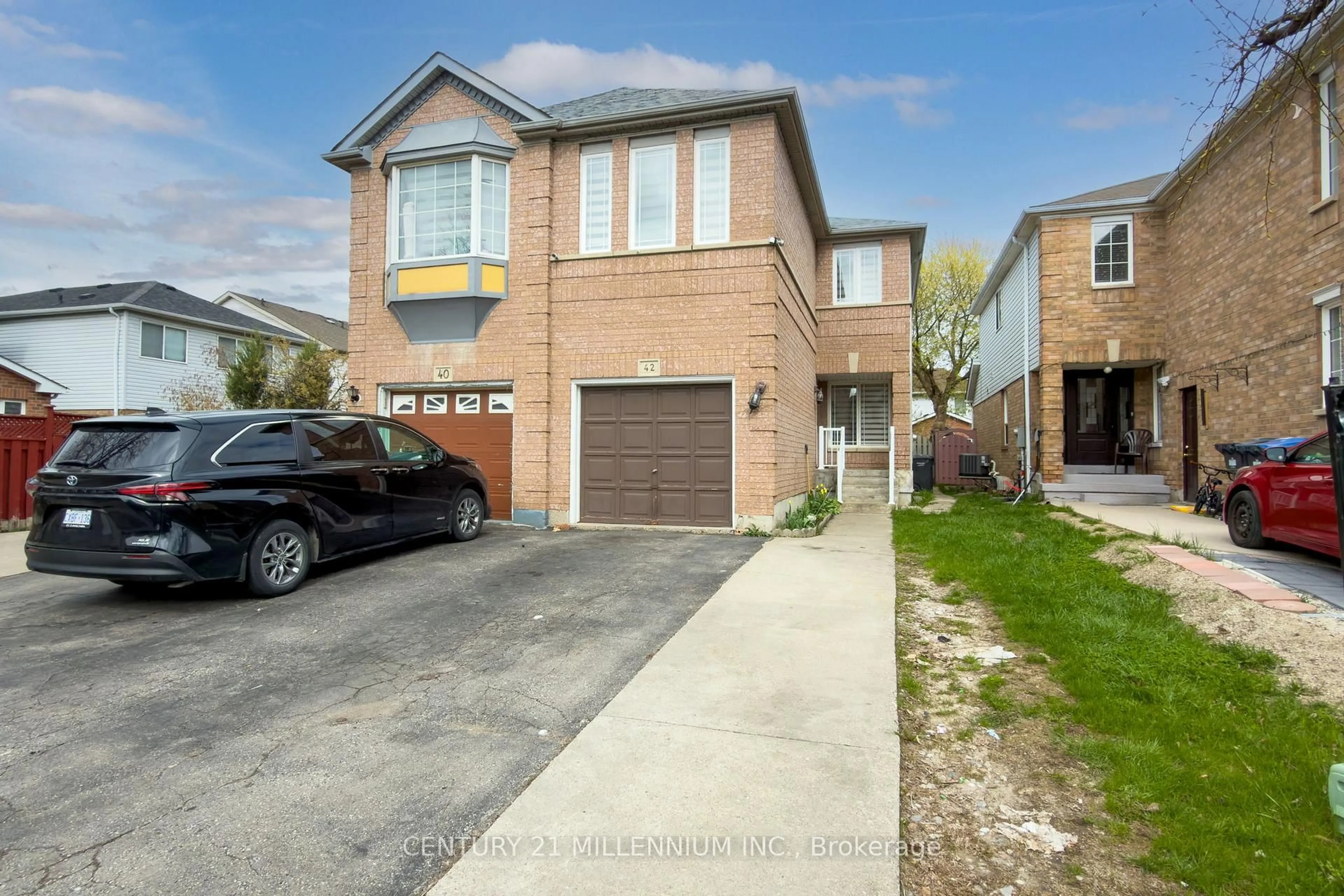 Home with brick exterior material, street for 42 Feathertop Lane, Brampton Ontario L6R 1W9