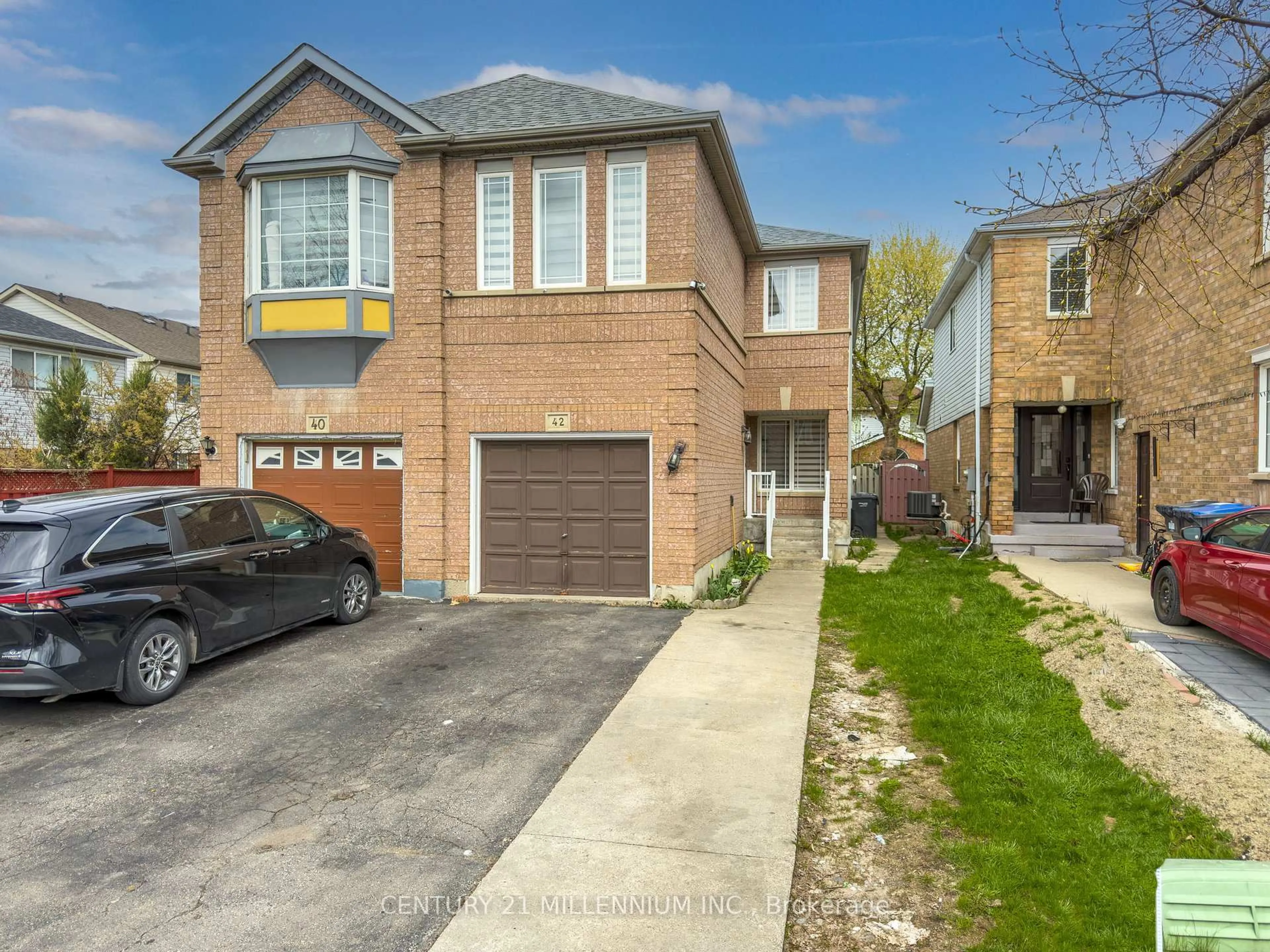 Home with brick exterior material, street for 42 Feathertop Lane, Brampton Ontario L6R 1W9