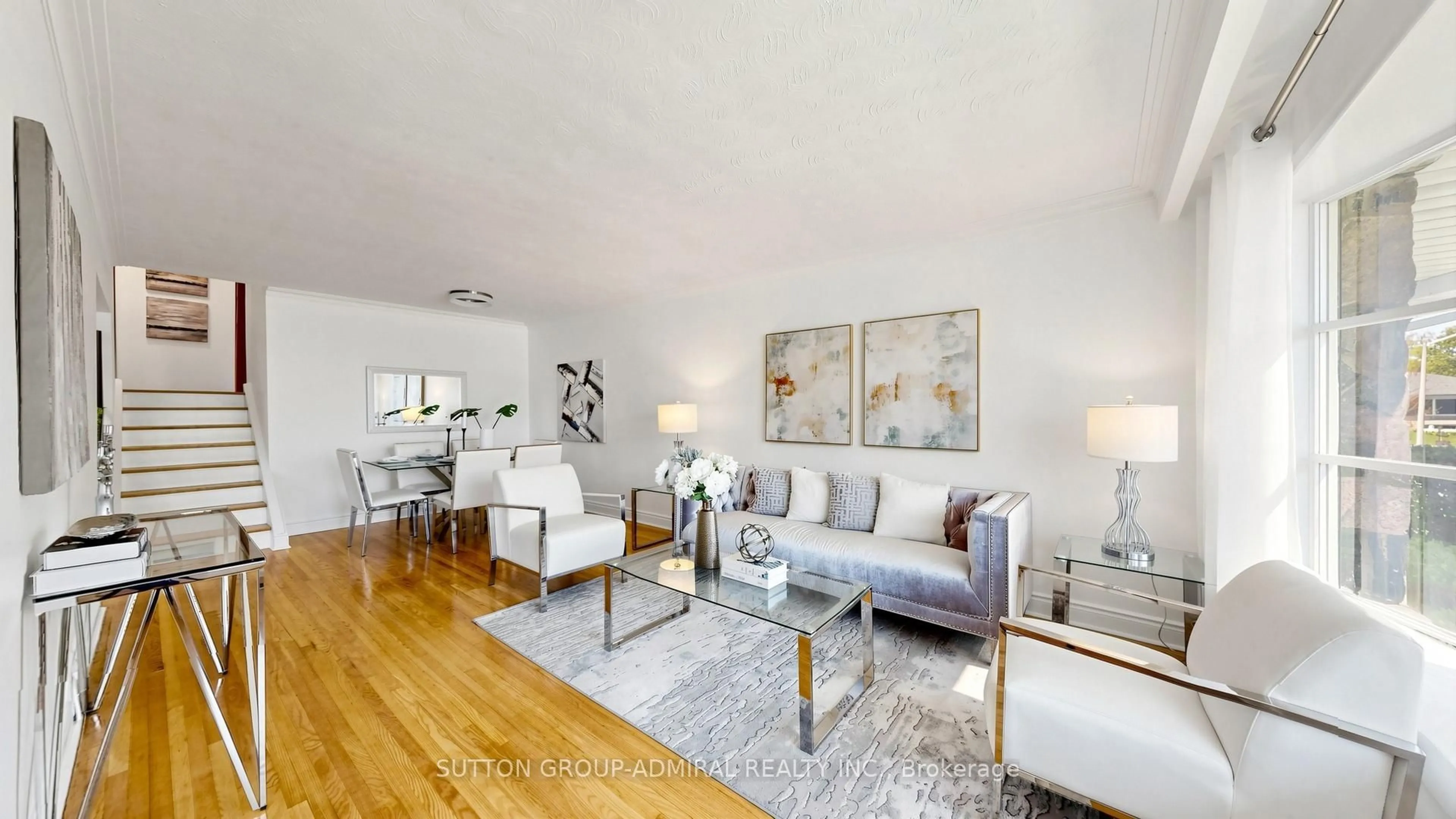 Living room with furniture, wood/laminate floor for 3 Rima Crt, Toronto Ontario M9C 4C7