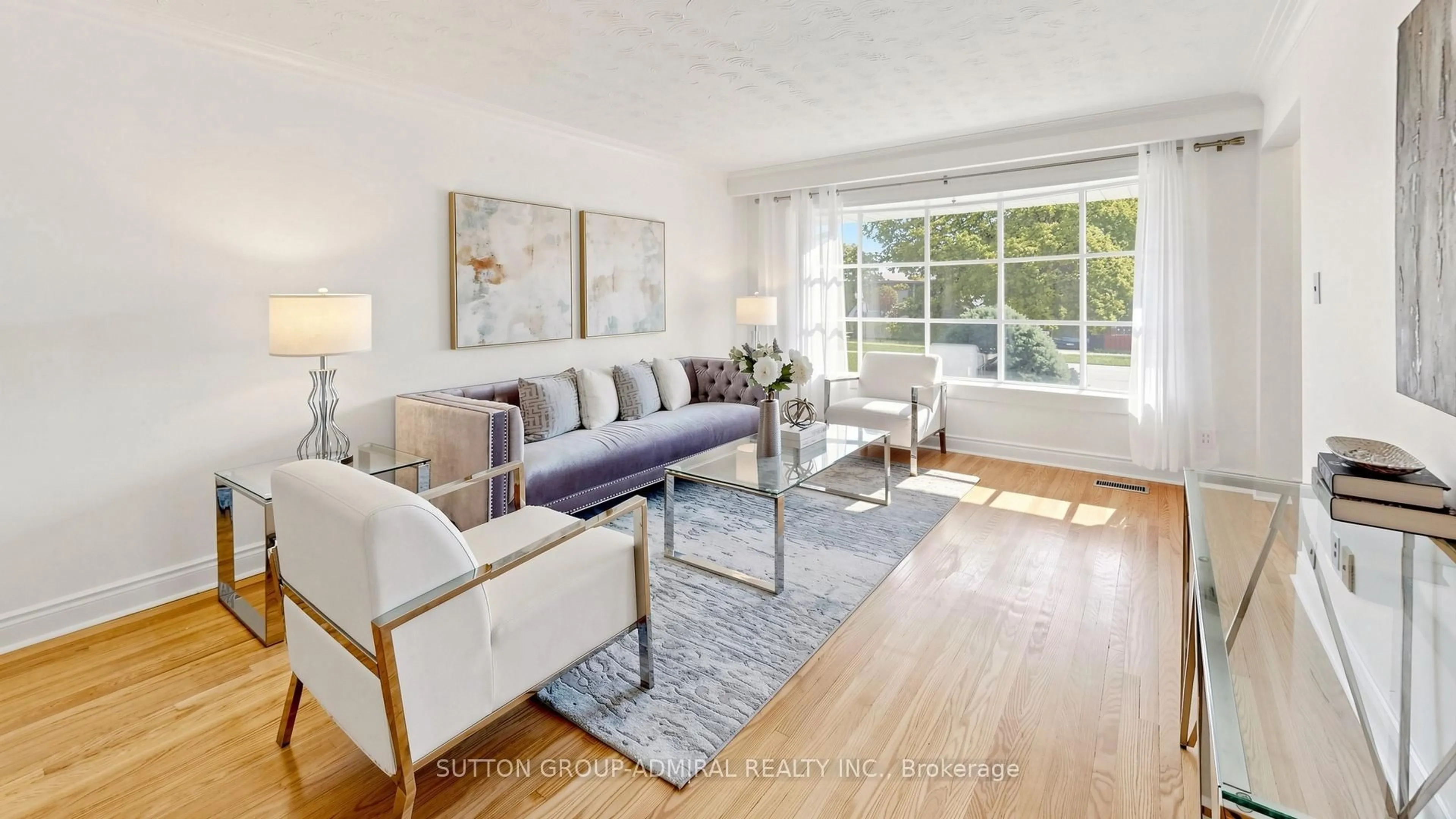 Living room with furniture, wood/laminate floor for 3 Rima Crt, Toronto Ontario M9C 4C7