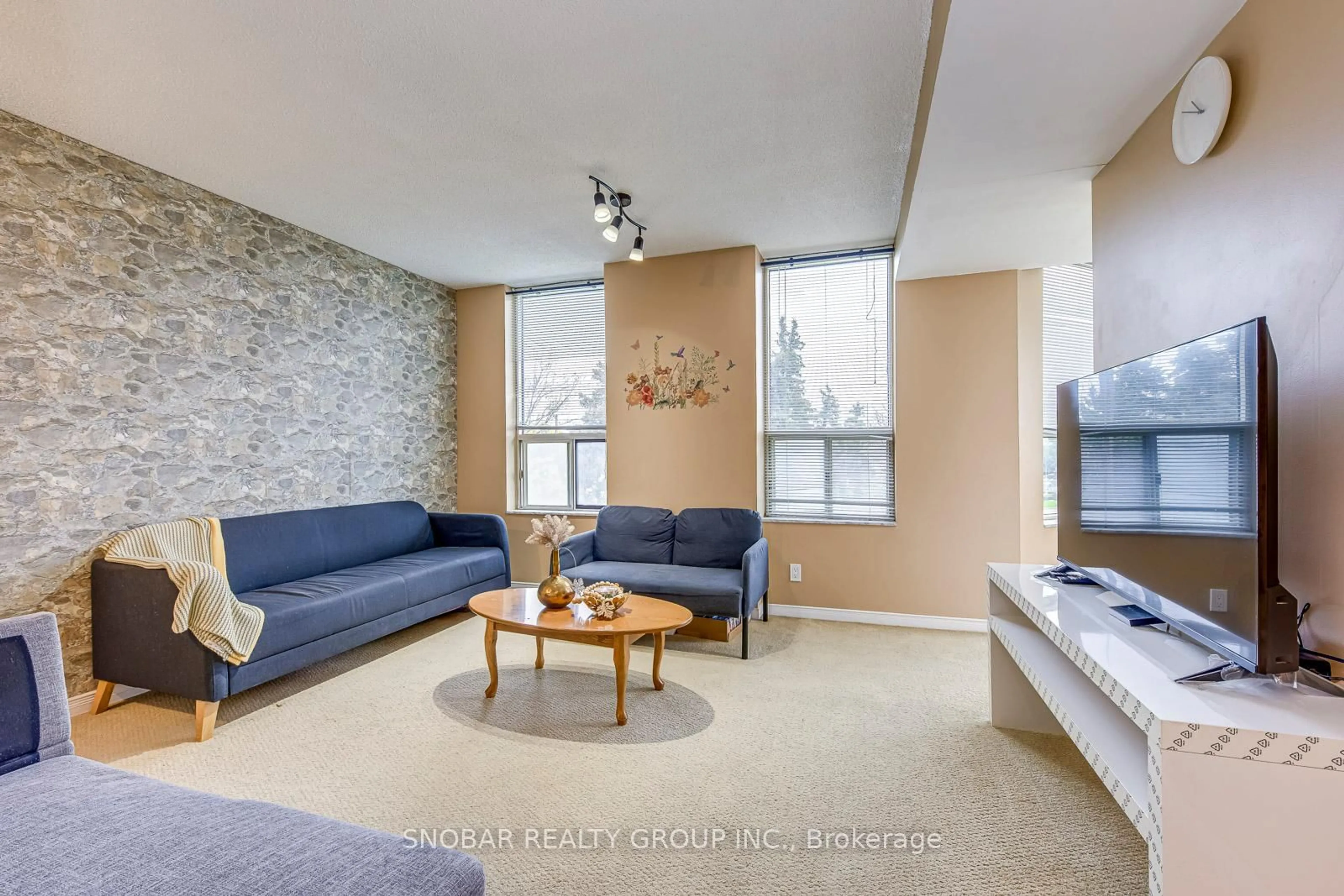 Living room with furniture, unknown for 6 Humberline Dr #206, Toronto Ontario M9W 6X8