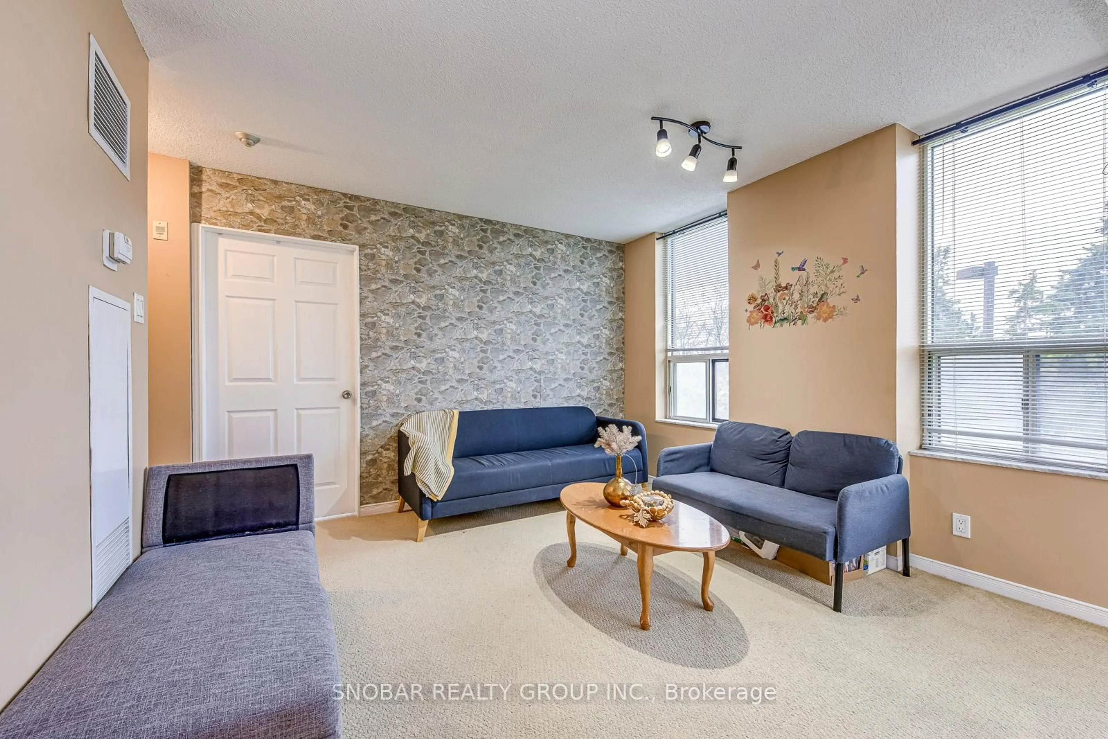 Living room with furniture, unknown for 6 Humberline Dr #206, Toronto Ontario M9W 6X8