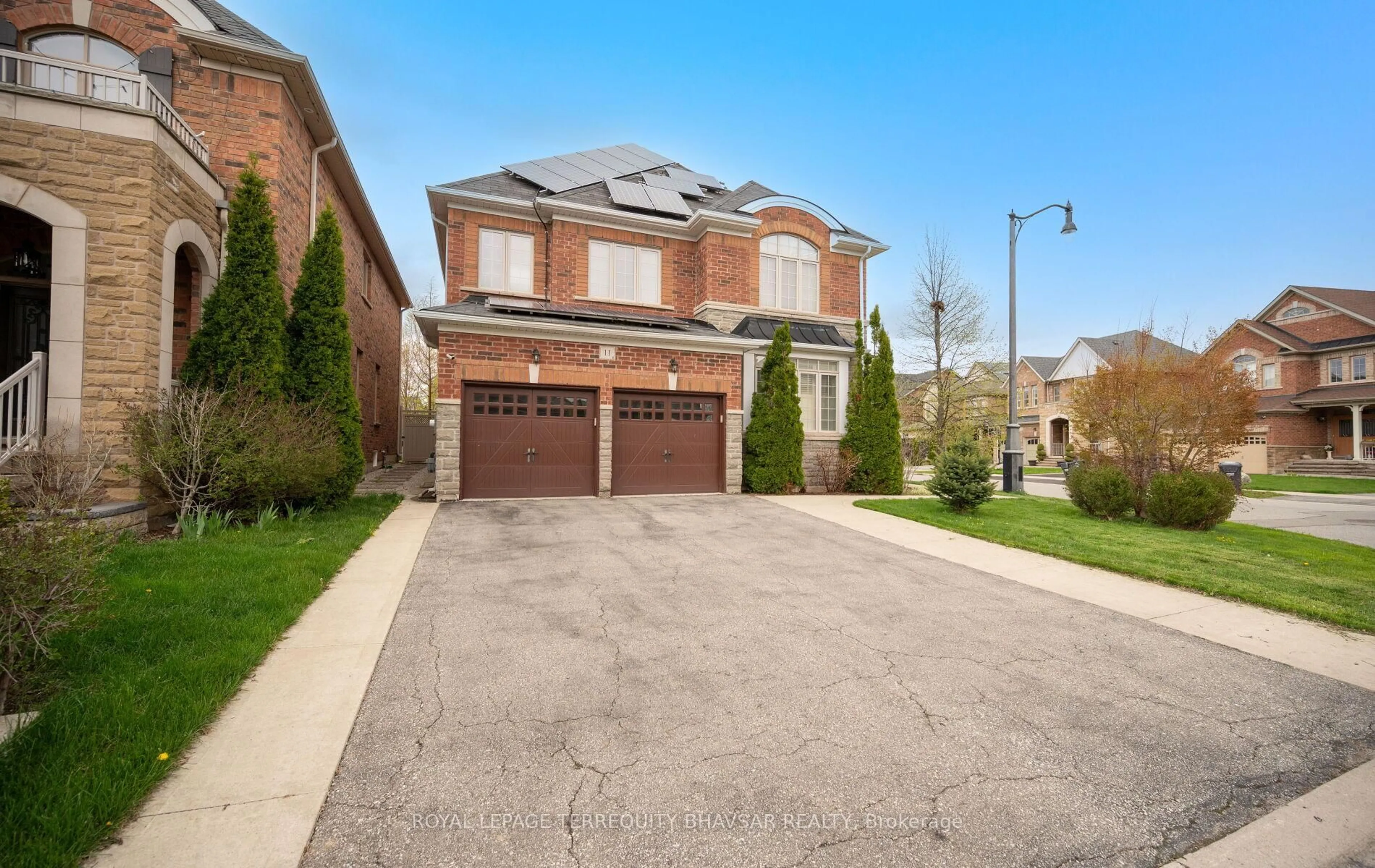Home with brick exterior material, street for 11 Intrigue Tr, Brampton Ontario L6X 0W8