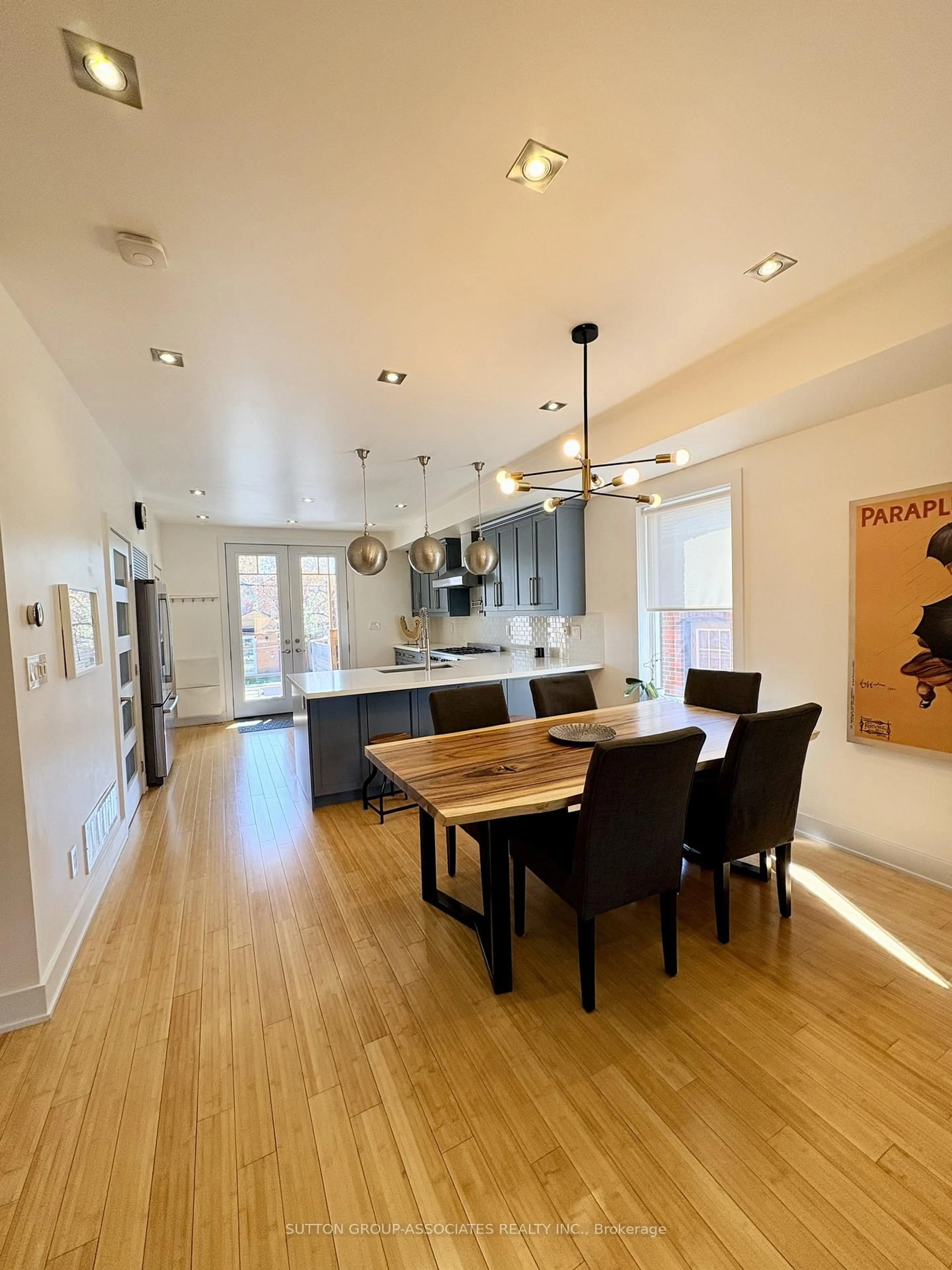 Open concept kitchen, wood/laminate floor for 215 Ennerdale Rd, Toronto Ontario M6E 4E1