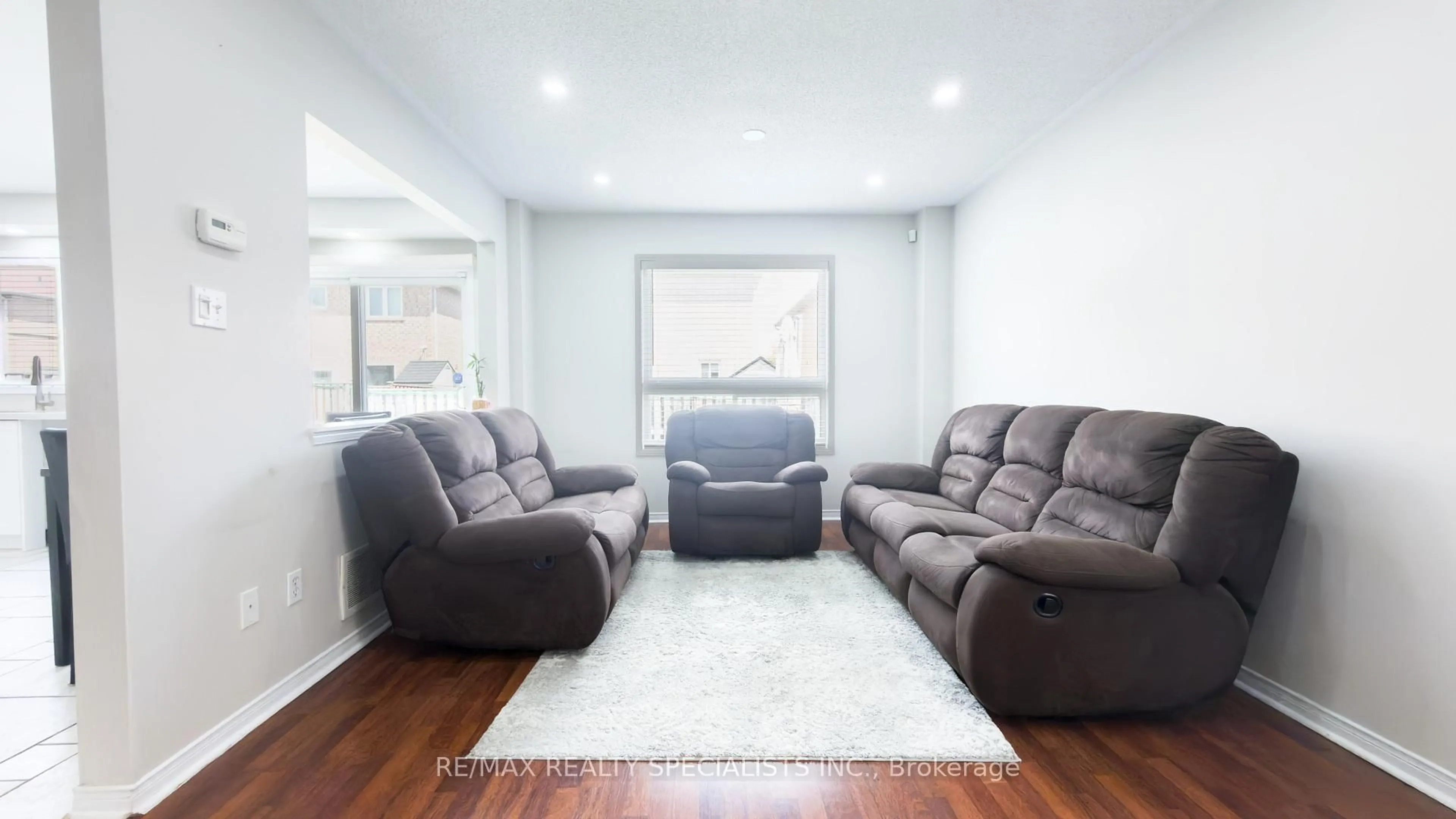 Living room with furniture, unknown for 27 Hiberton Cres, Brampton Ontario L7A 3E2