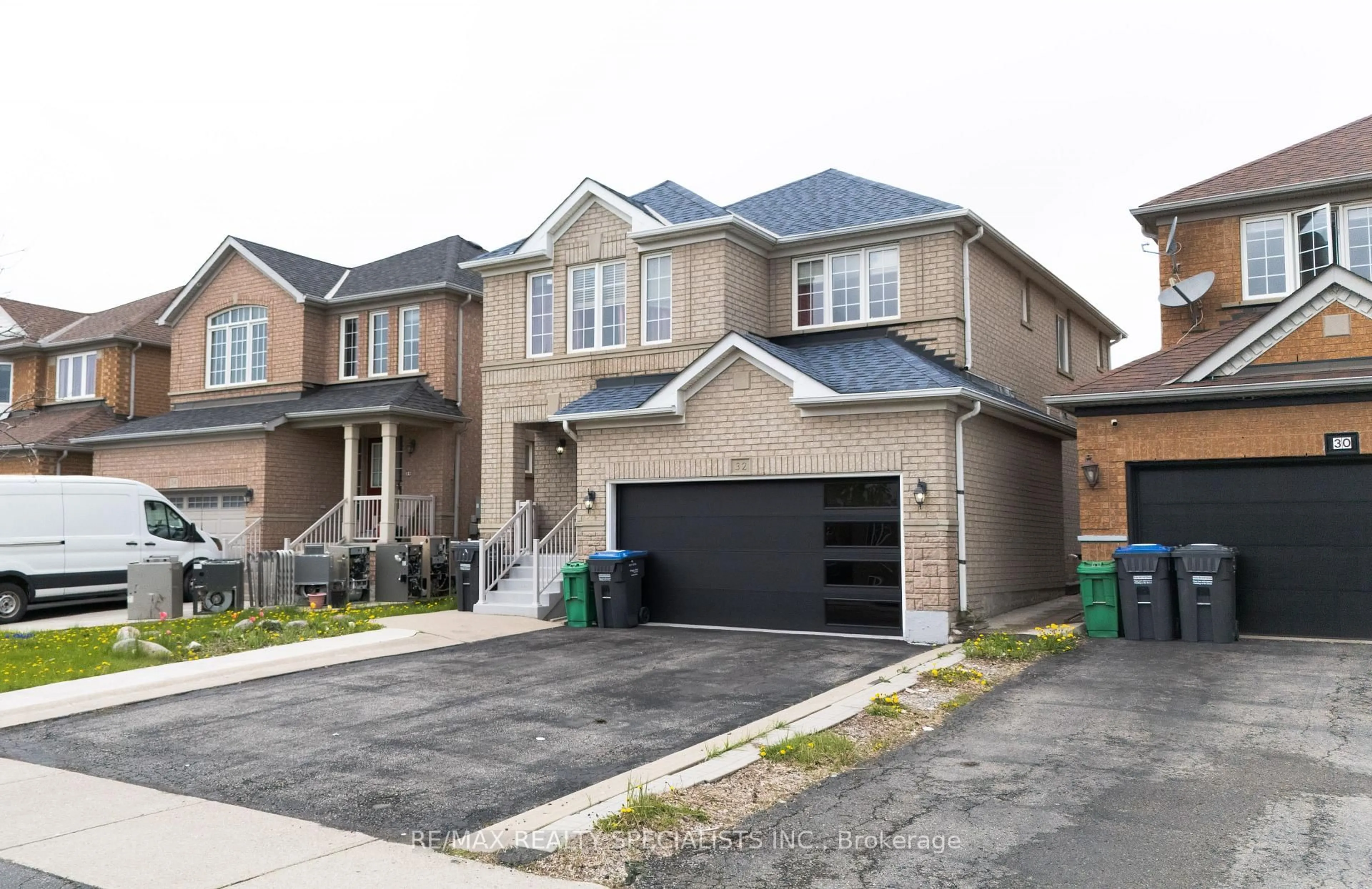 Home with brick exterior material, street for 32 Feather Reed Way, Brampton Ontario L6R 3A3