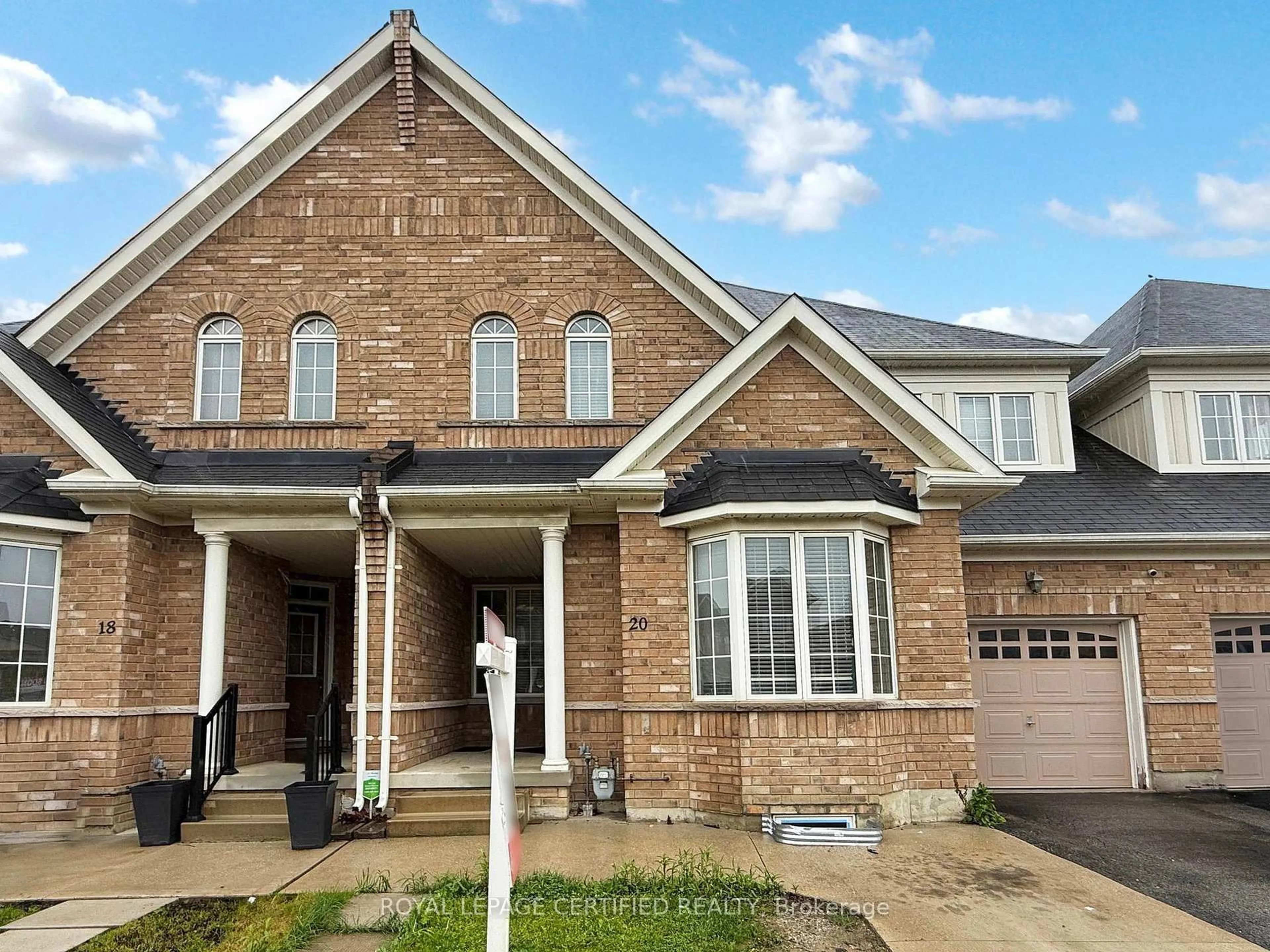 Home with brick exterior material, street for 20 Naperton Dr, Brampton Ontario L6R 0Z5