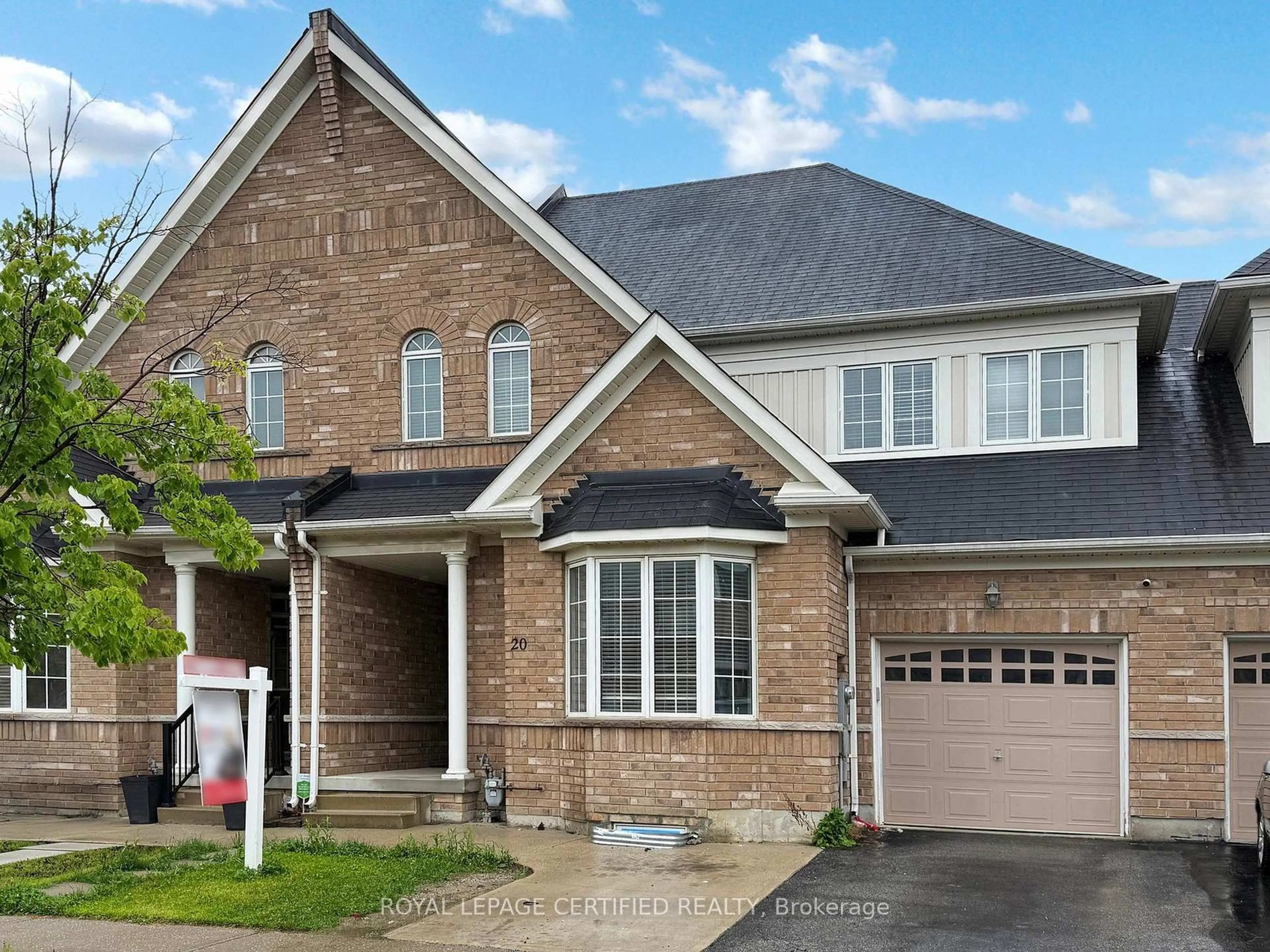 Home with brick exterior material, street for 20 Naperton Dr, Brampton Ontario L6R 0Z5