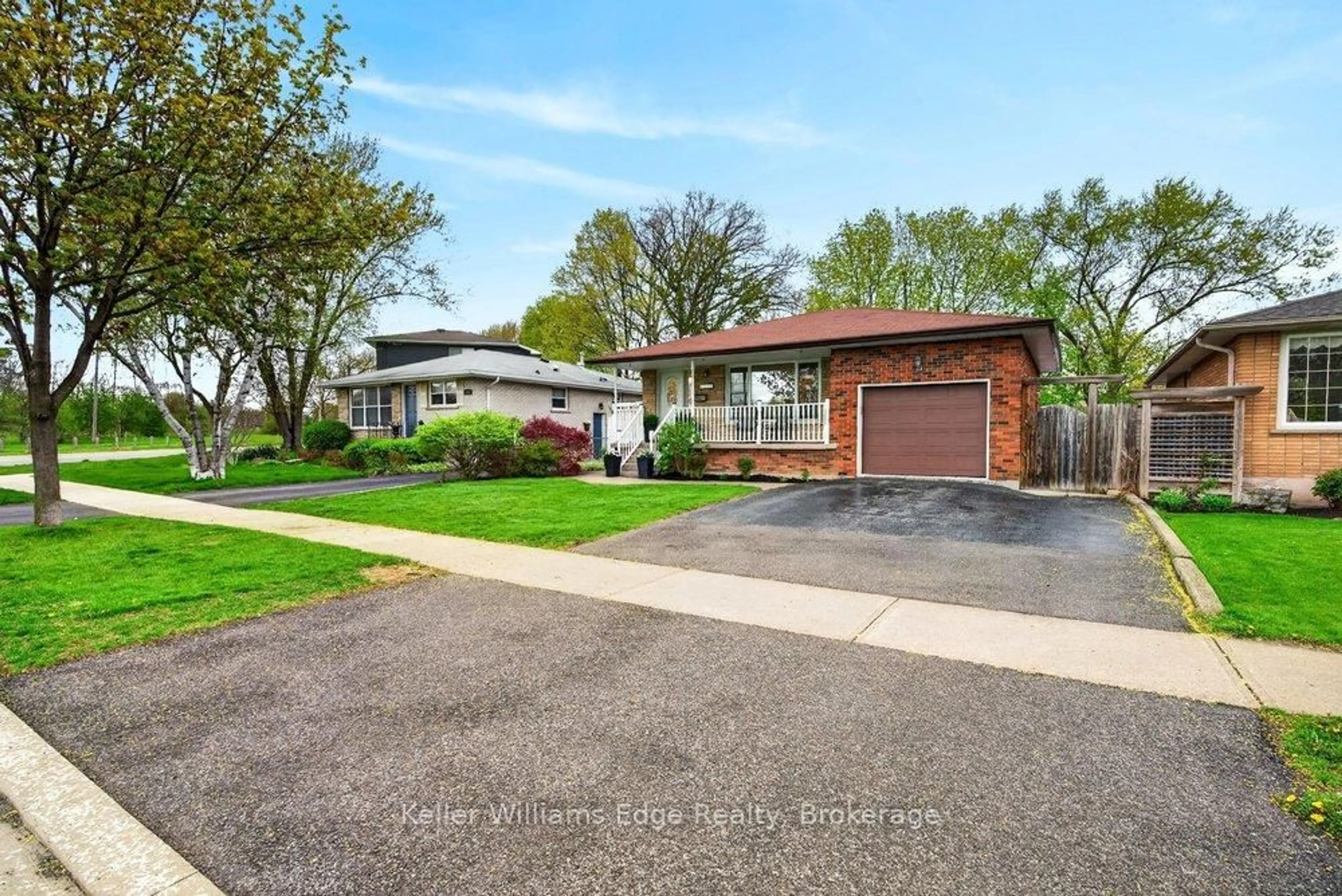 Home with brick exterior material, street for 1313 Tavistock Dr, Burlington Ontario L7P 2N8