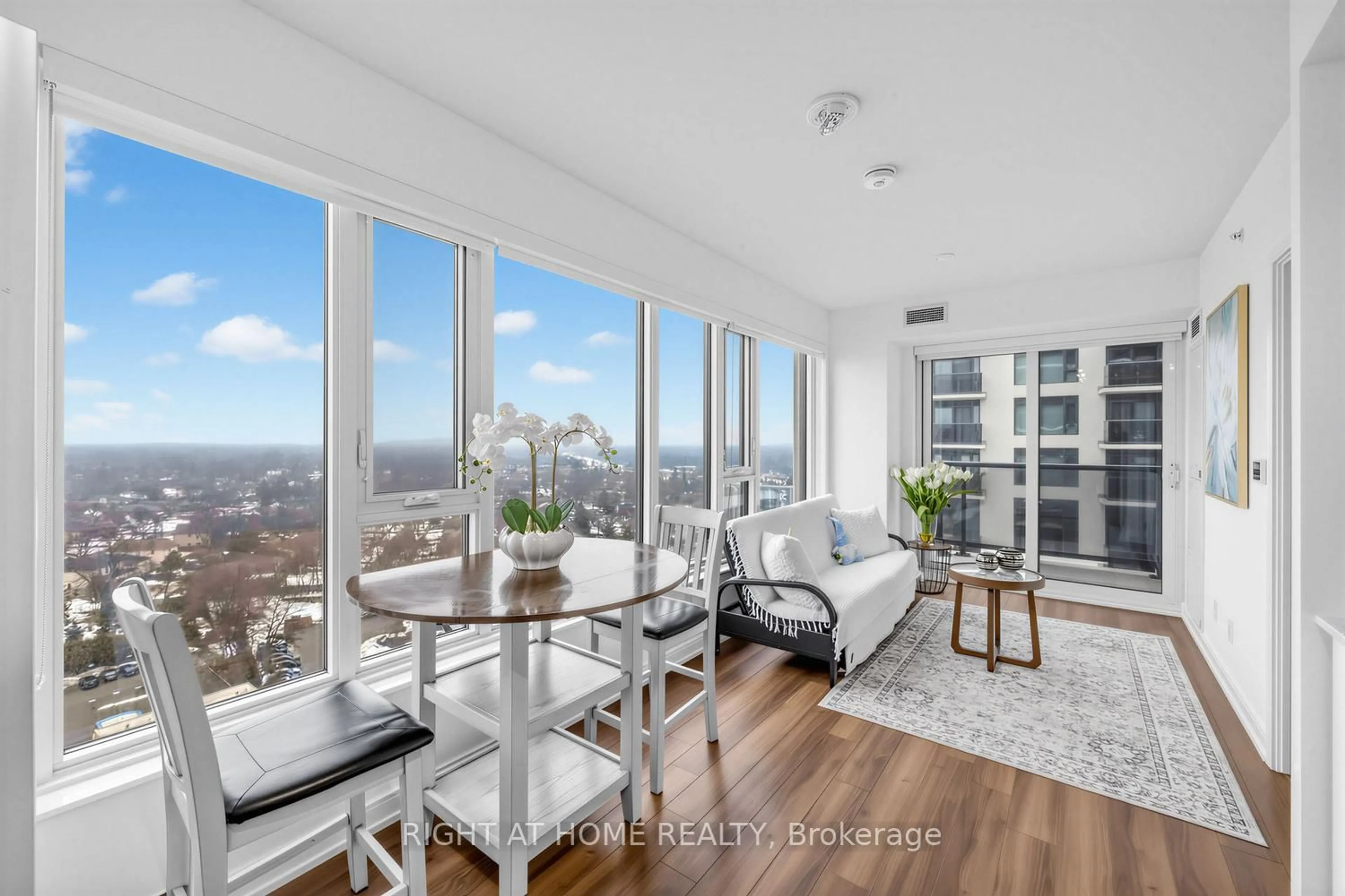 Living room with furniture, wood/laminate floor for 30 Samuel Wood Way #1404, Toronto Ontario M9B 0C9