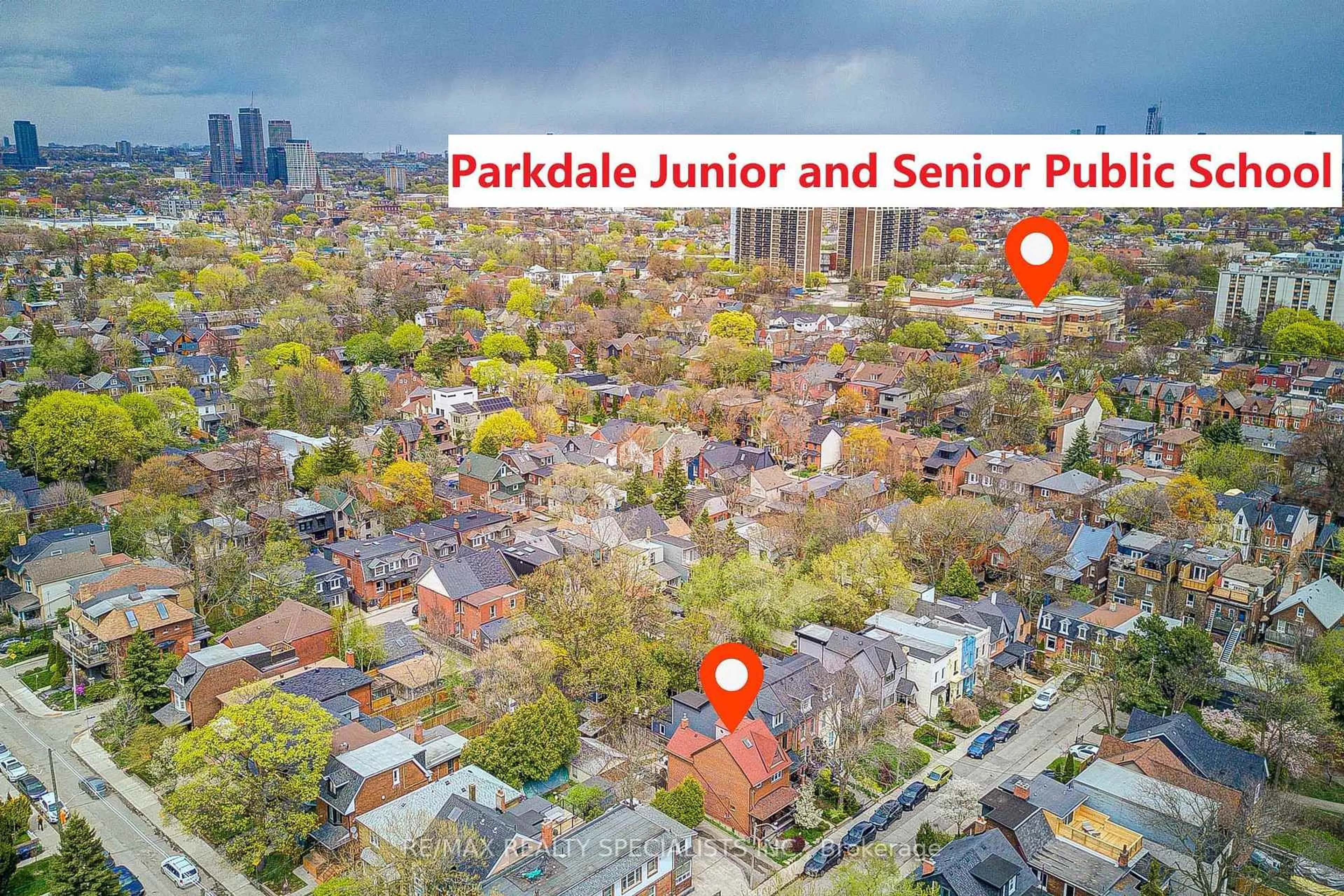 A pic from outside/outdoor area/front of a property/back of a property/a pic from drone, city buildings view from balcony for 34 Saunders Ave, Toronto Ontario M6R 1B8