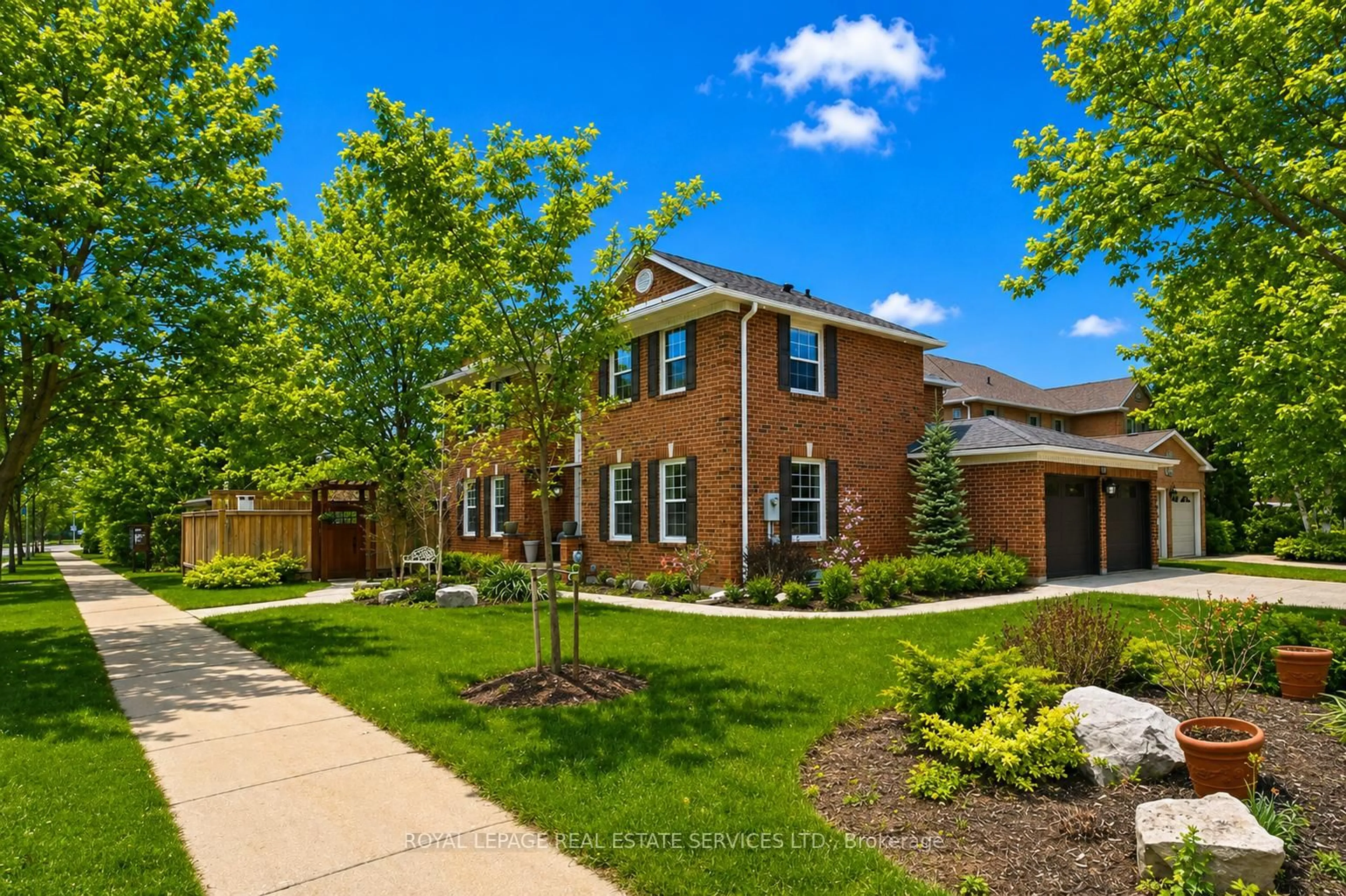 Home with brick exterior material, street for 1256 Fieldcrest Lane, Oakville Ontario L6M 2L8