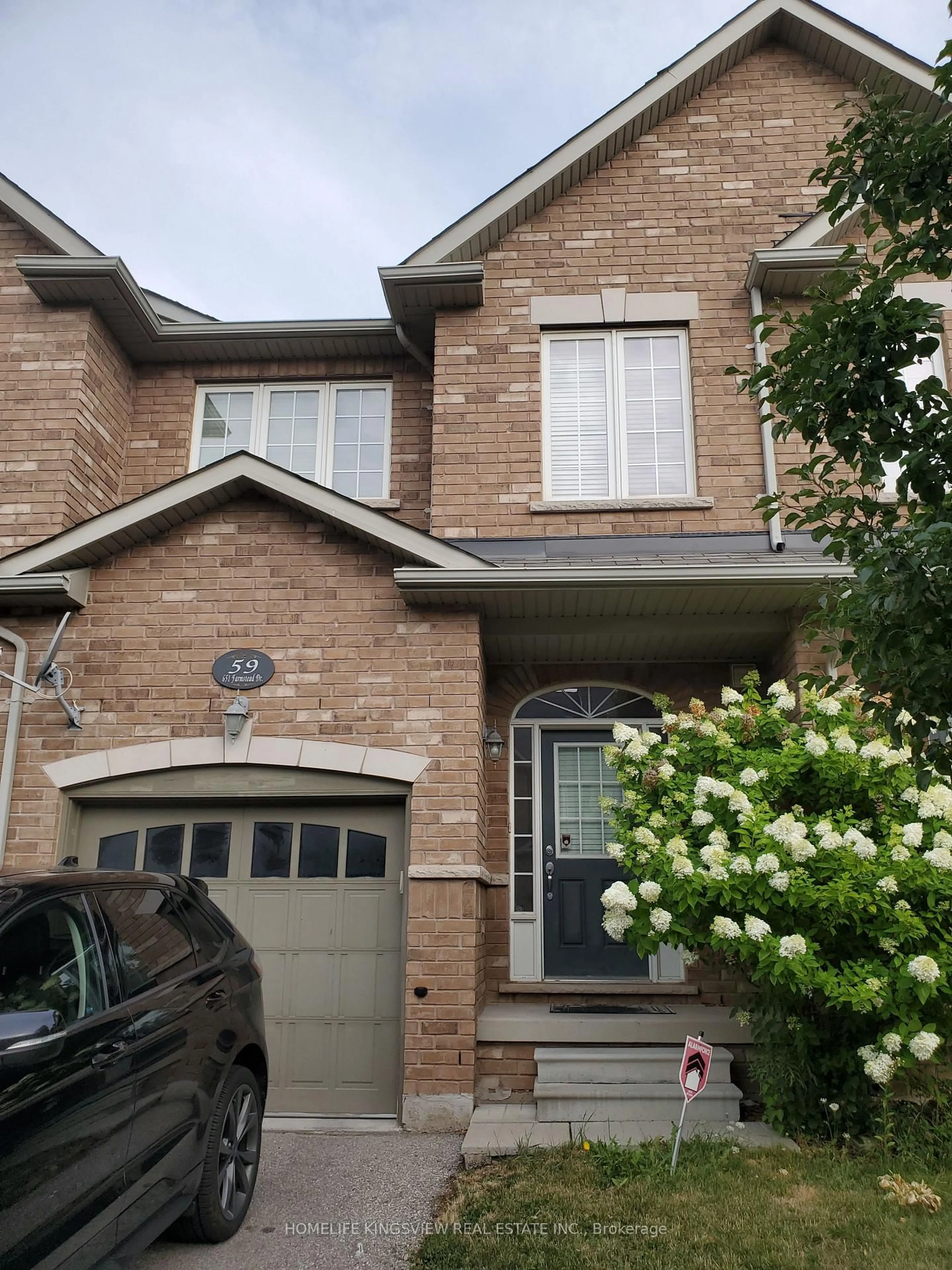 Home with brick exterior material, street for 651 Farmstead Dr #59, Milton Ontario L9T 7W2