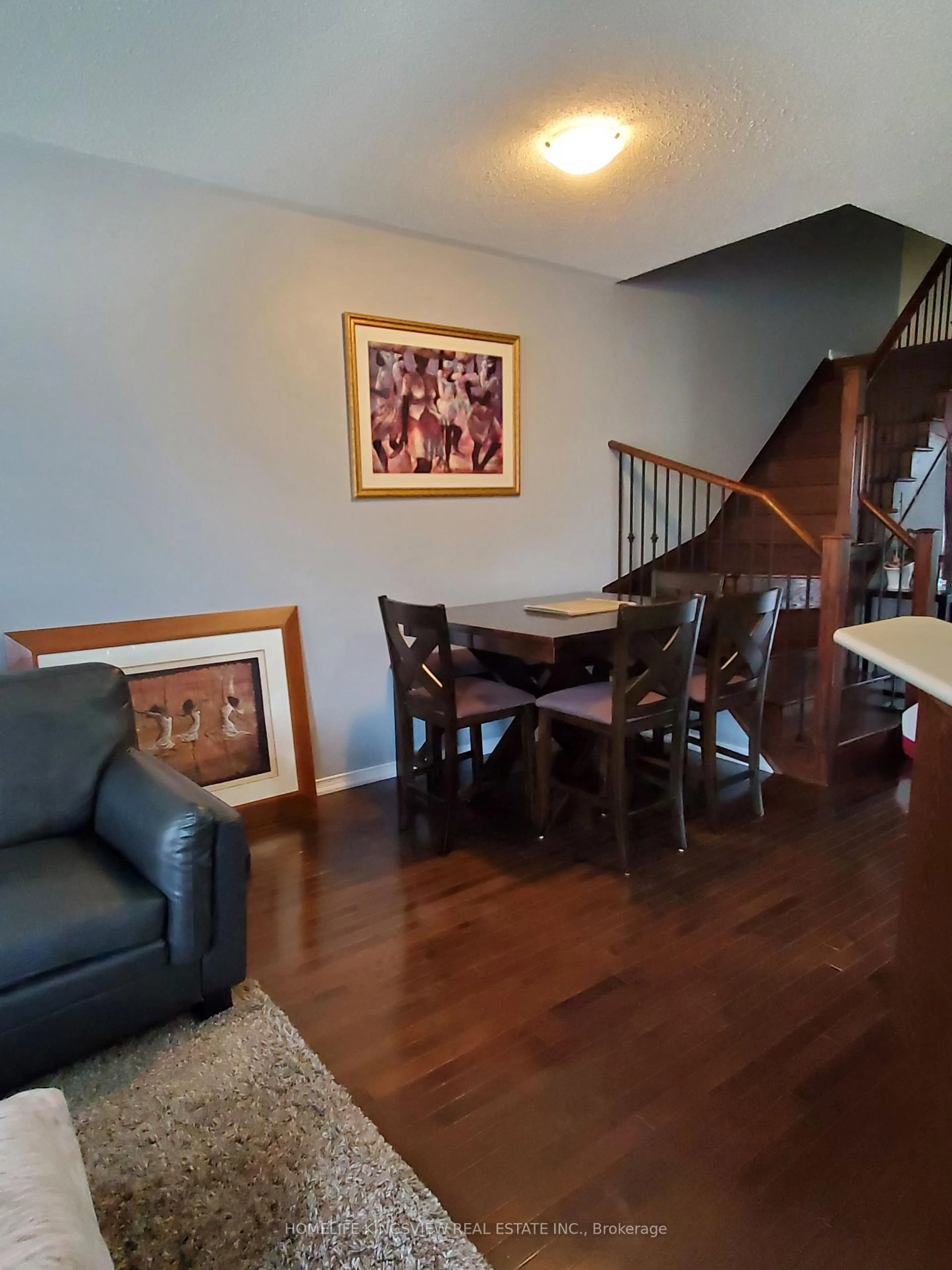 Dining room, wood/laminate floor for 651 Farmstead Dr #59, Milton Ontario L9T 7W2