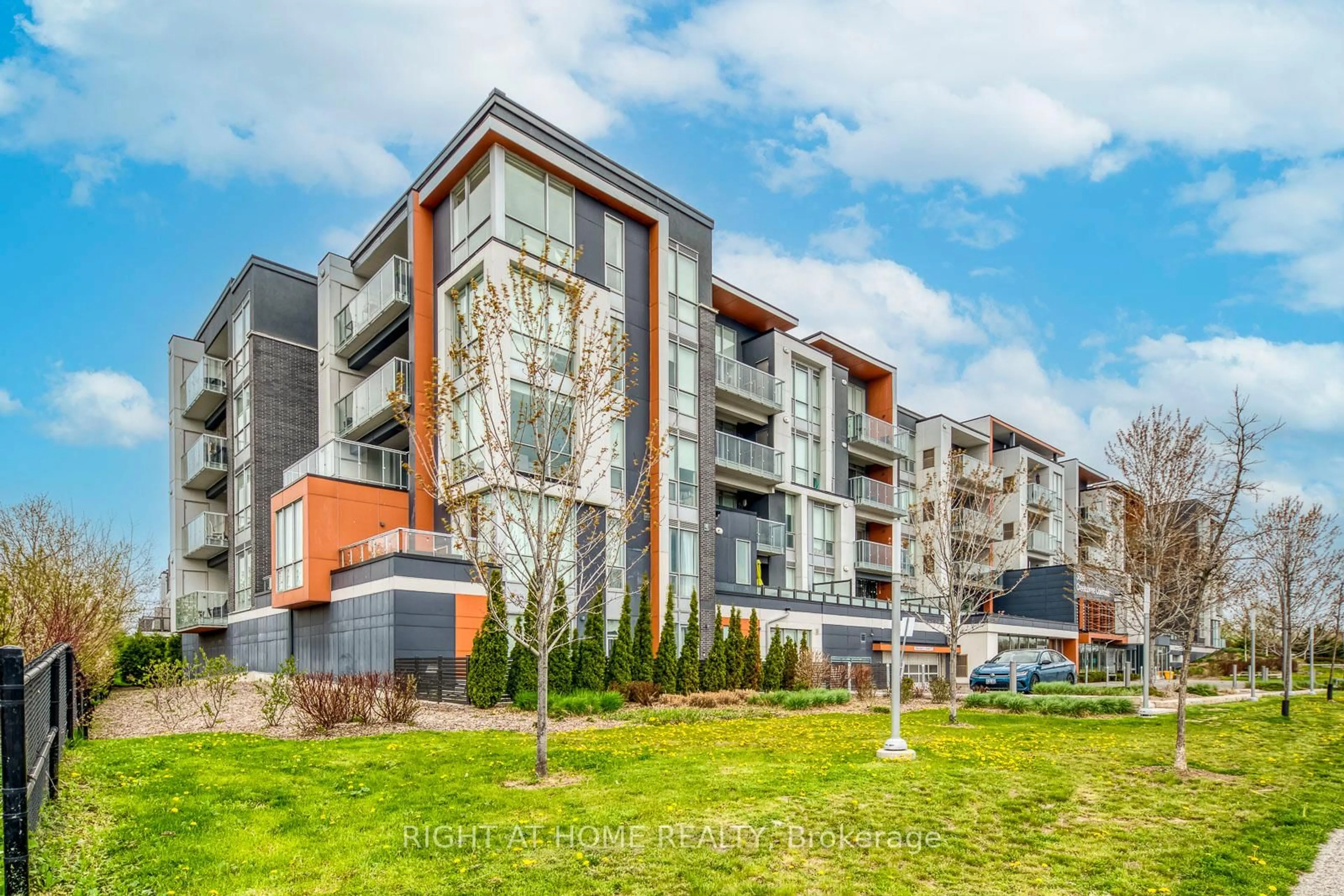 A pic from outside/outdoor area/front of a property/back of a property/a pic from drone, unknown for 3028 Creekshore Common #215, Oakville Ontario L6M 5K6