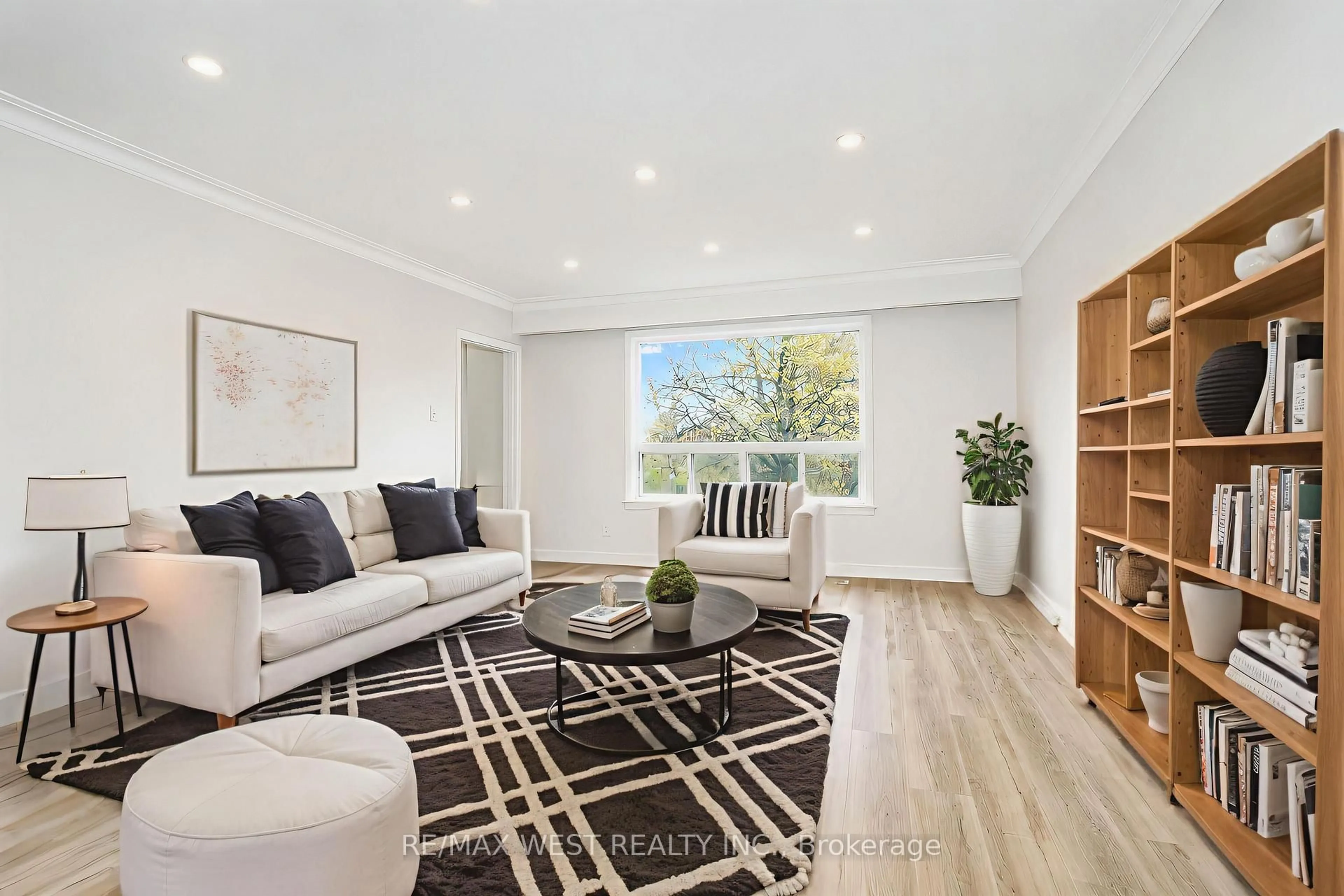 Living room with furniture, wood/laminate floor for 23 Irwin Rd, Toronto Ontario M9W 2P6