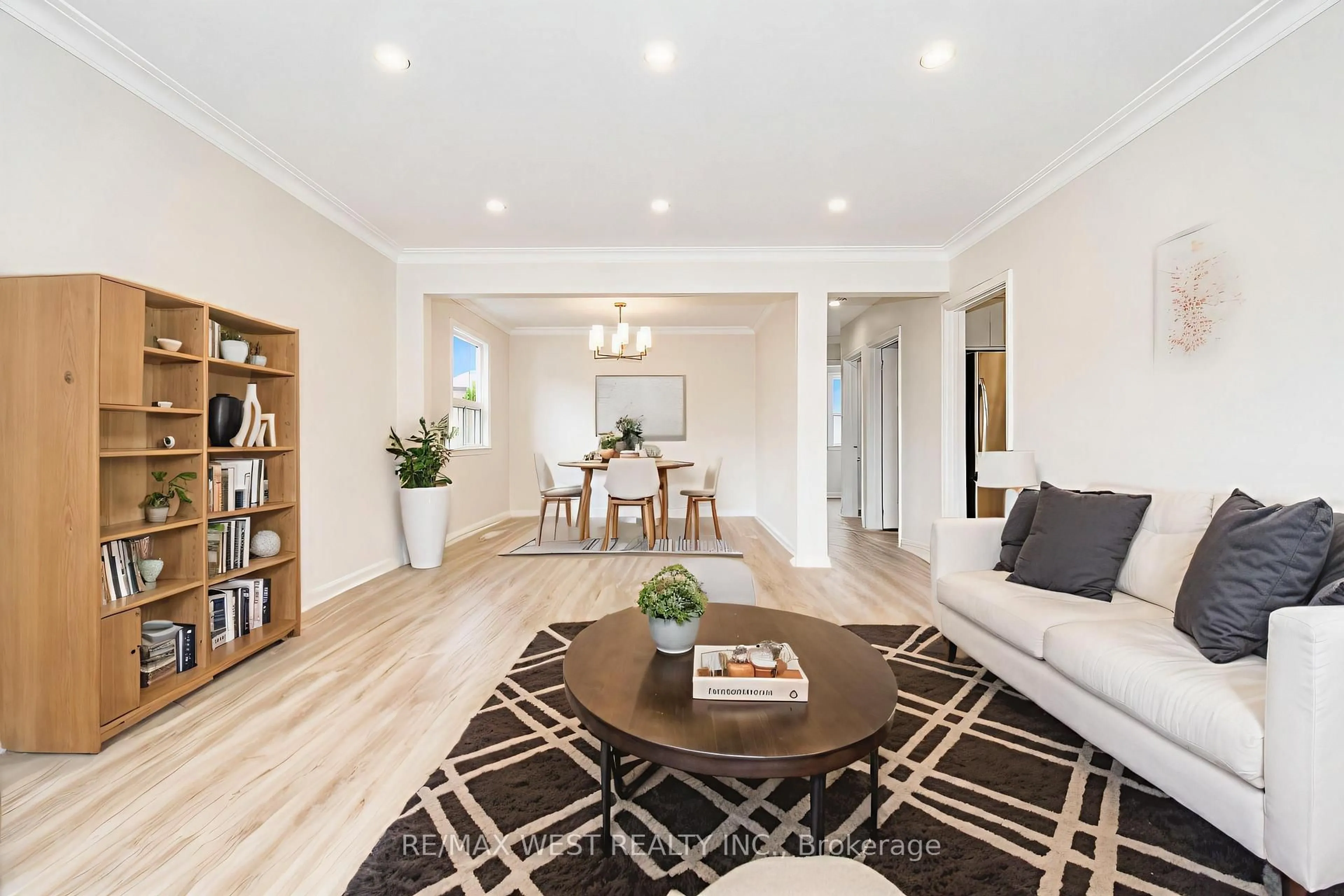 Living room with furniture, wood/laminate floor for 23 Irwin Rd, Toronto Ontario M9W 2P6