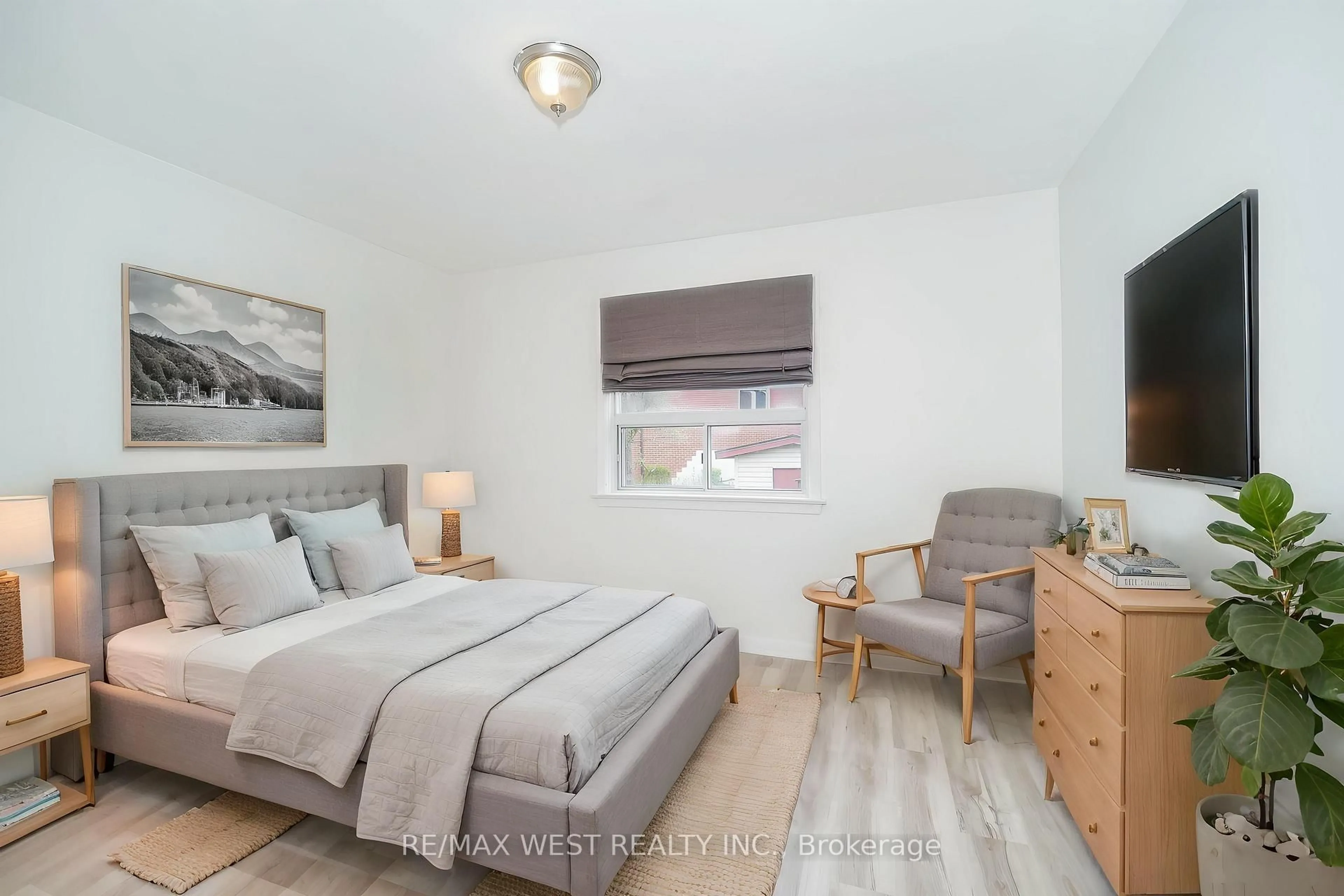 Bedroom with bed, wood/laminate floor for 23 Irwin Rd, Toronto Ontario M9W 2P6