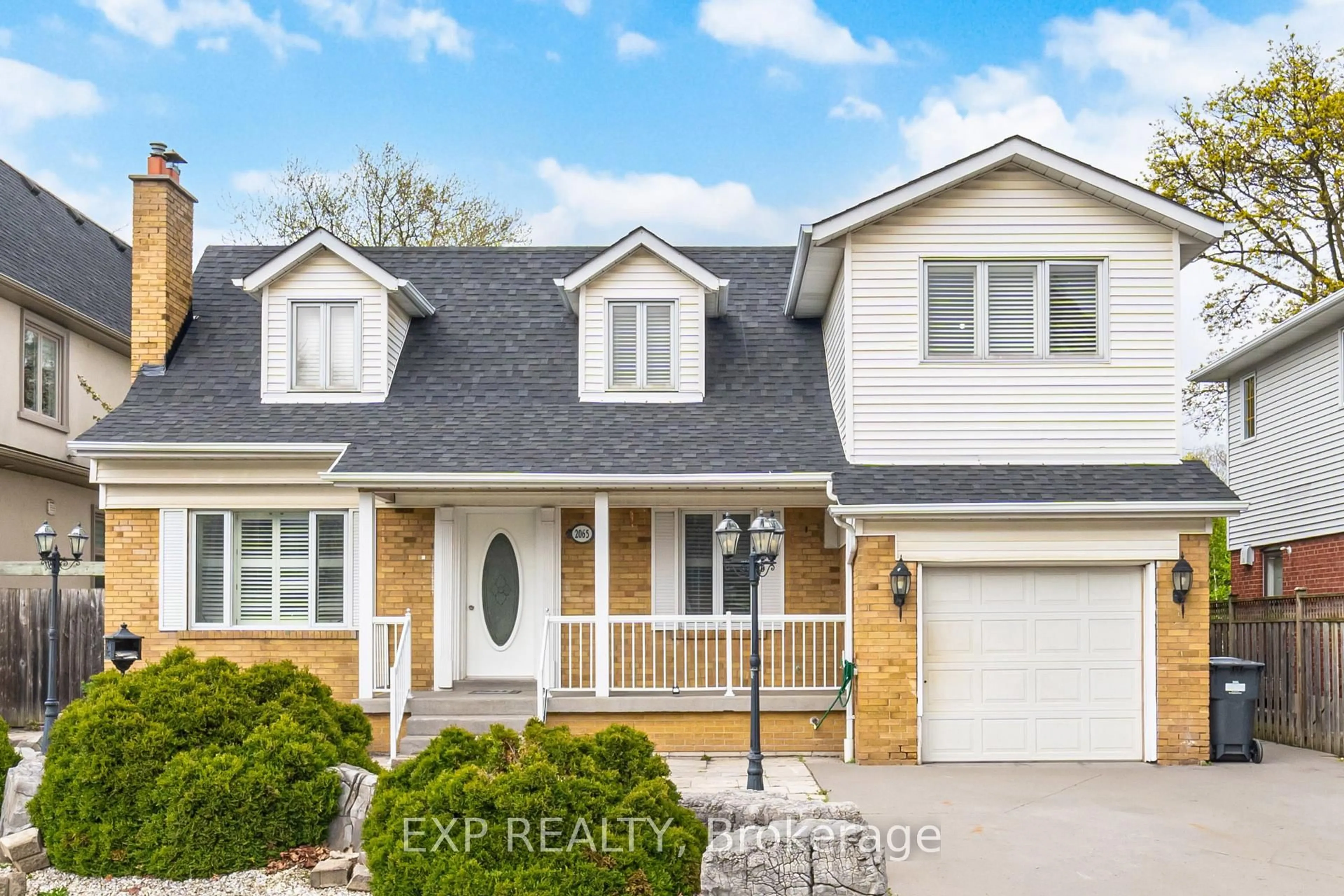 Home with vinyl exterior material, street for 2065 Westfield Dr, Mississauga Ontario L4Y 1P2