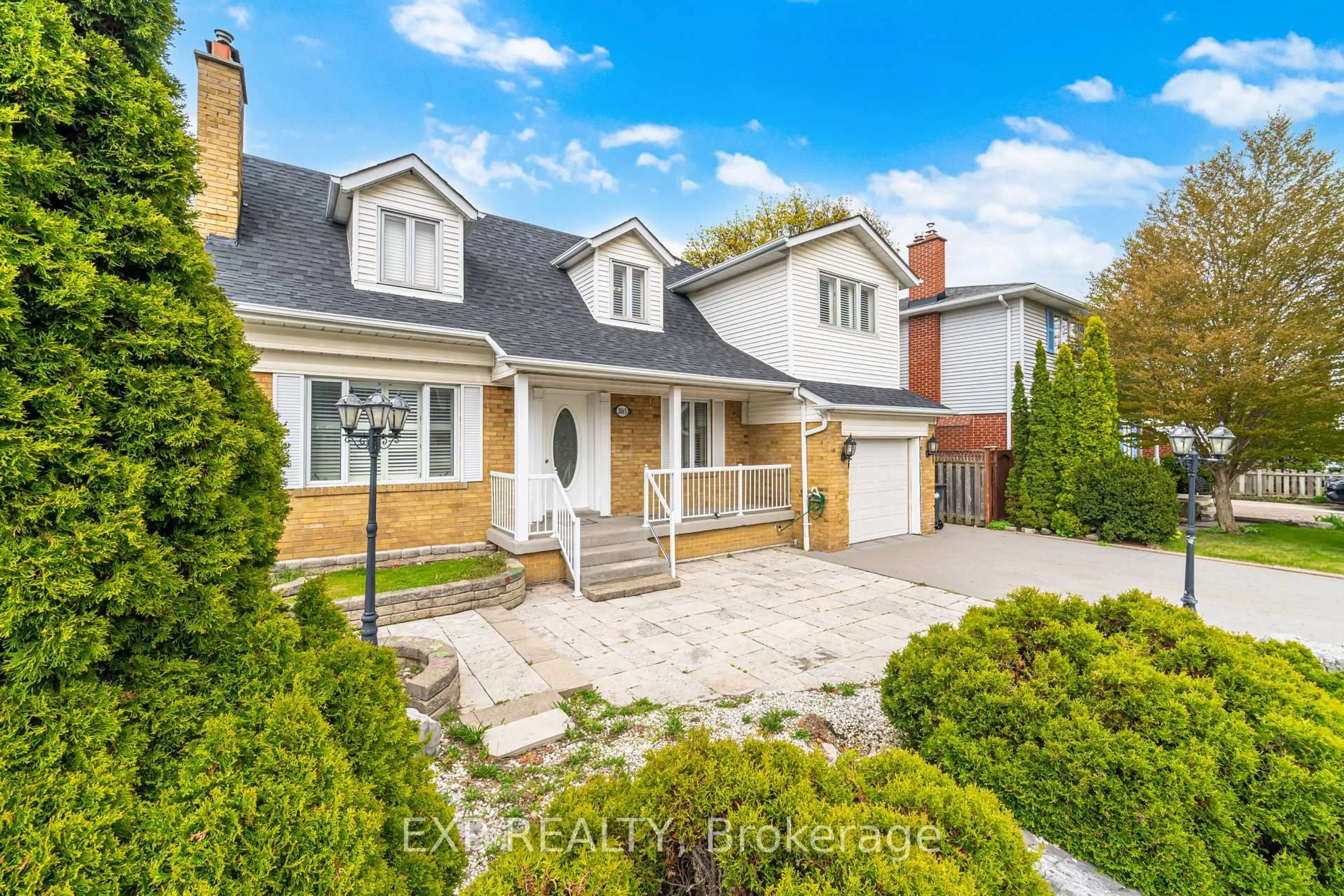 Home with brick exterior material, street for 2065 Westfield Dr, Mississauga Ontario L4Y 1P2