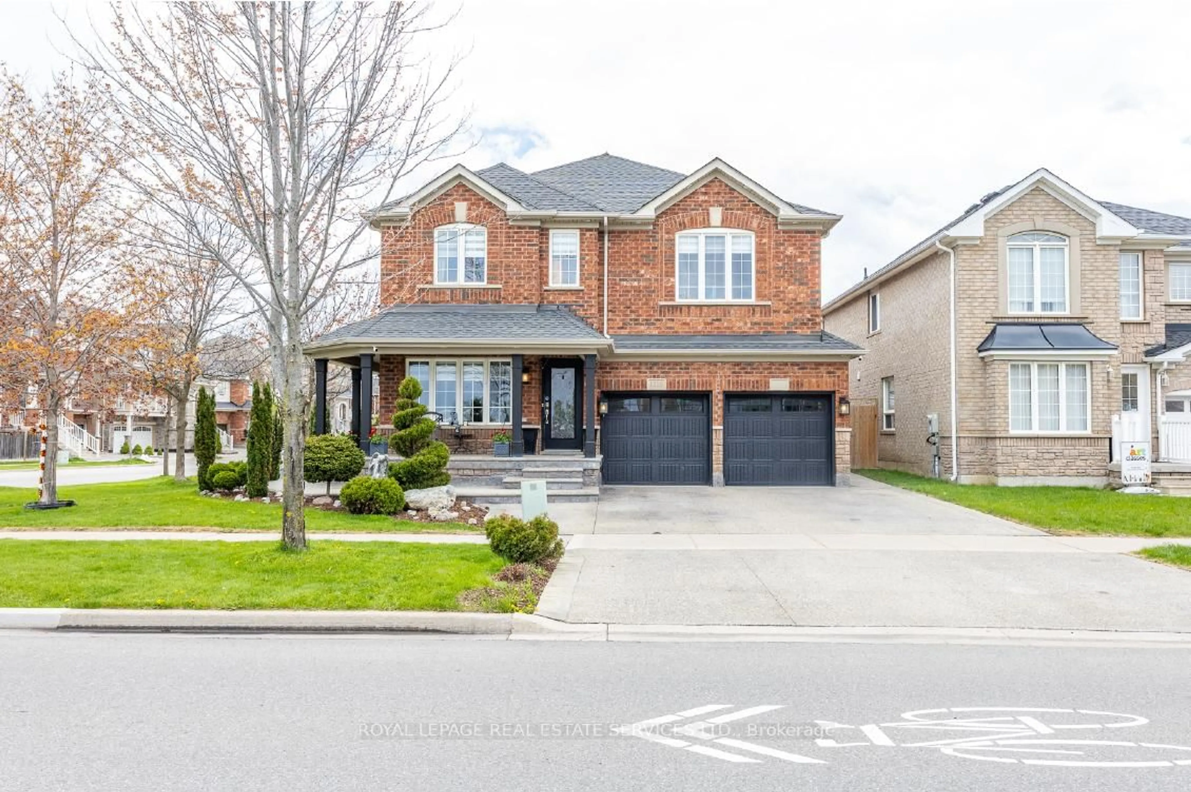 Home with brick exterior material, street for 1218 Costigan Rd, Milton Ontario L9T 6N8
