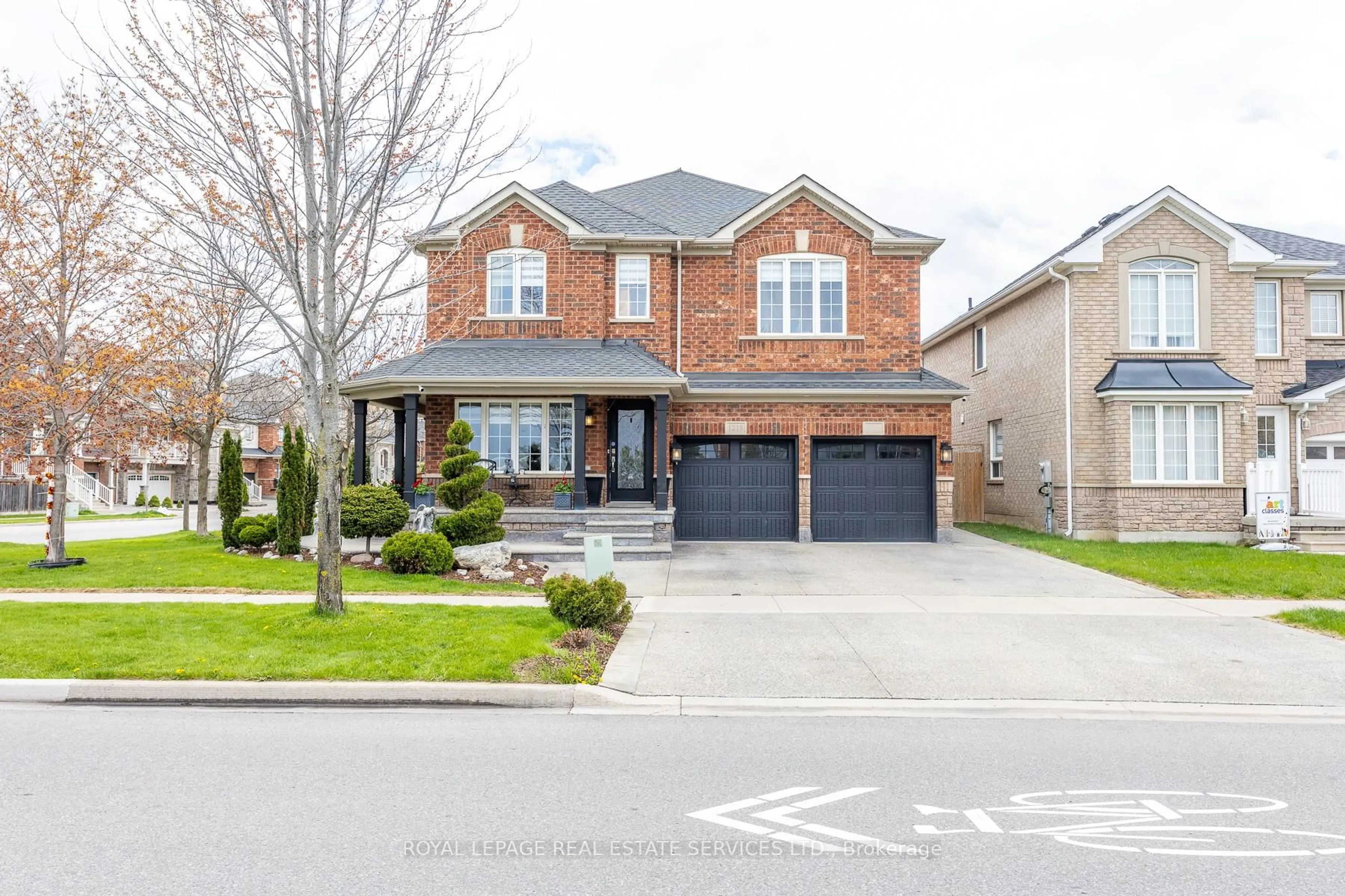 Home with brick exterior material, street for 1218 Costigan Rd, Milton Ontario L9T 6N8