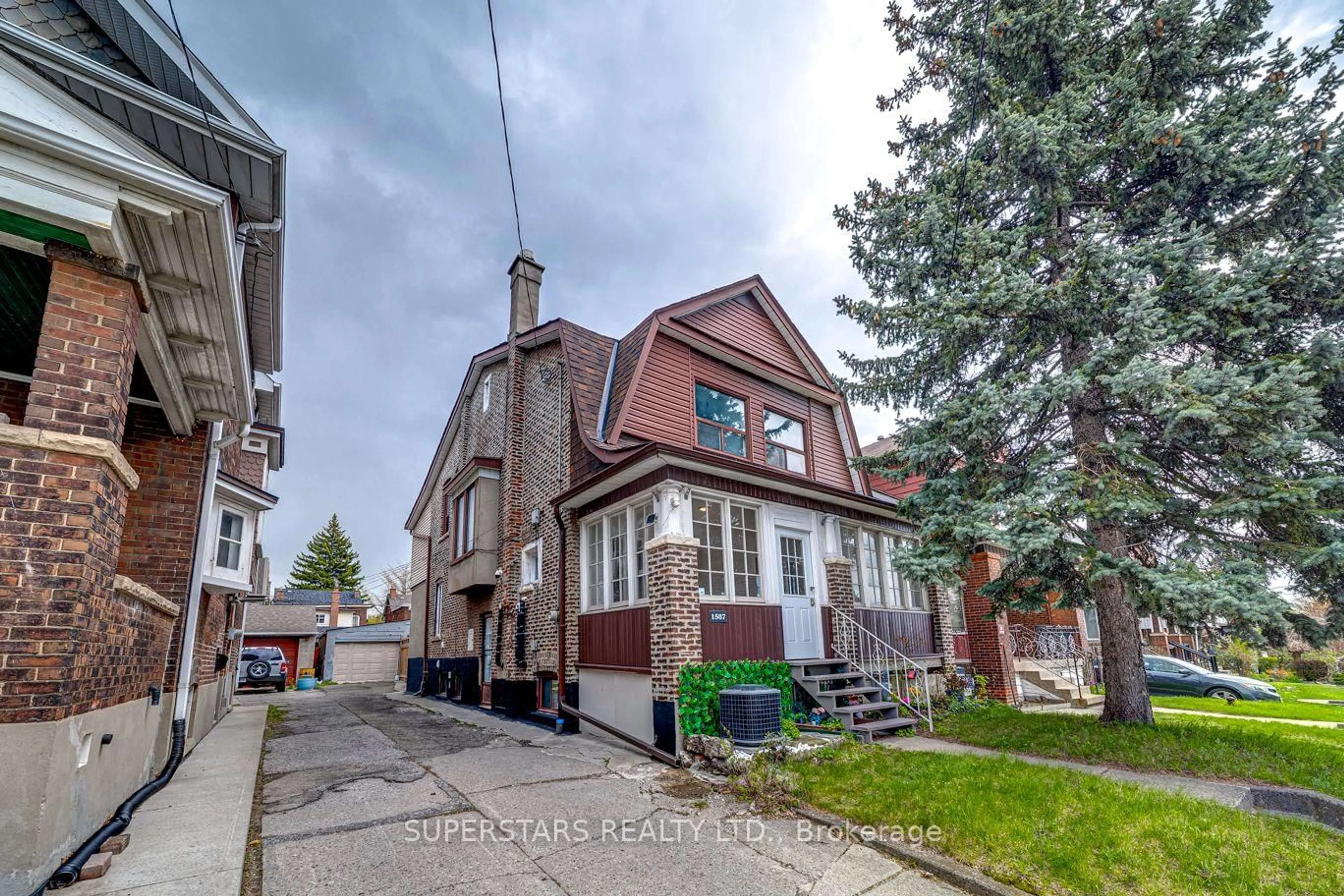 Home with brick exterior material, street for 1587 DUFFERIN St, Toronto Ontario M6H 3L5