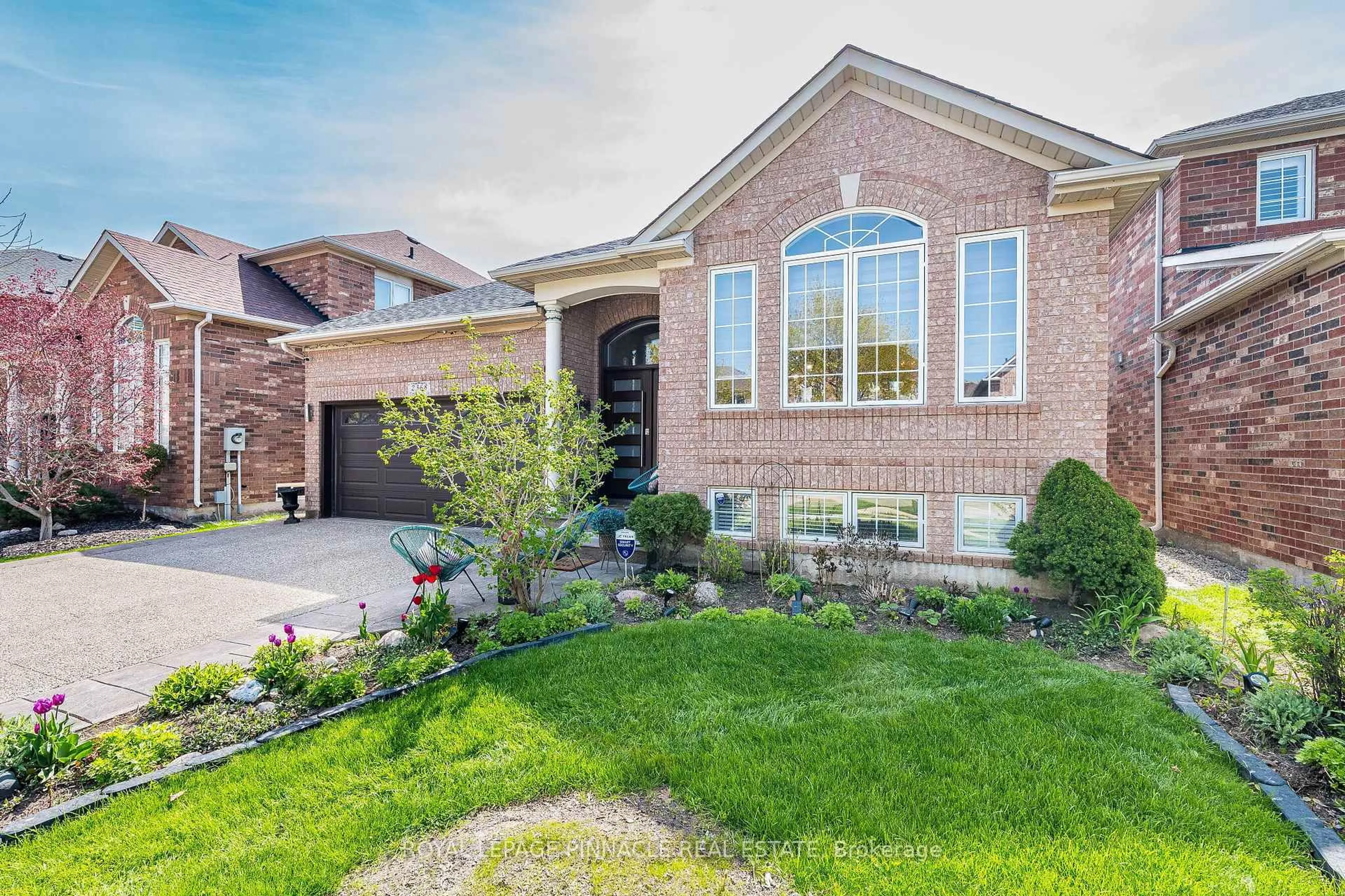 Home with brick exterior material, street for 2368 Foxhole Circ, Oakville Ontario L6M 4X4