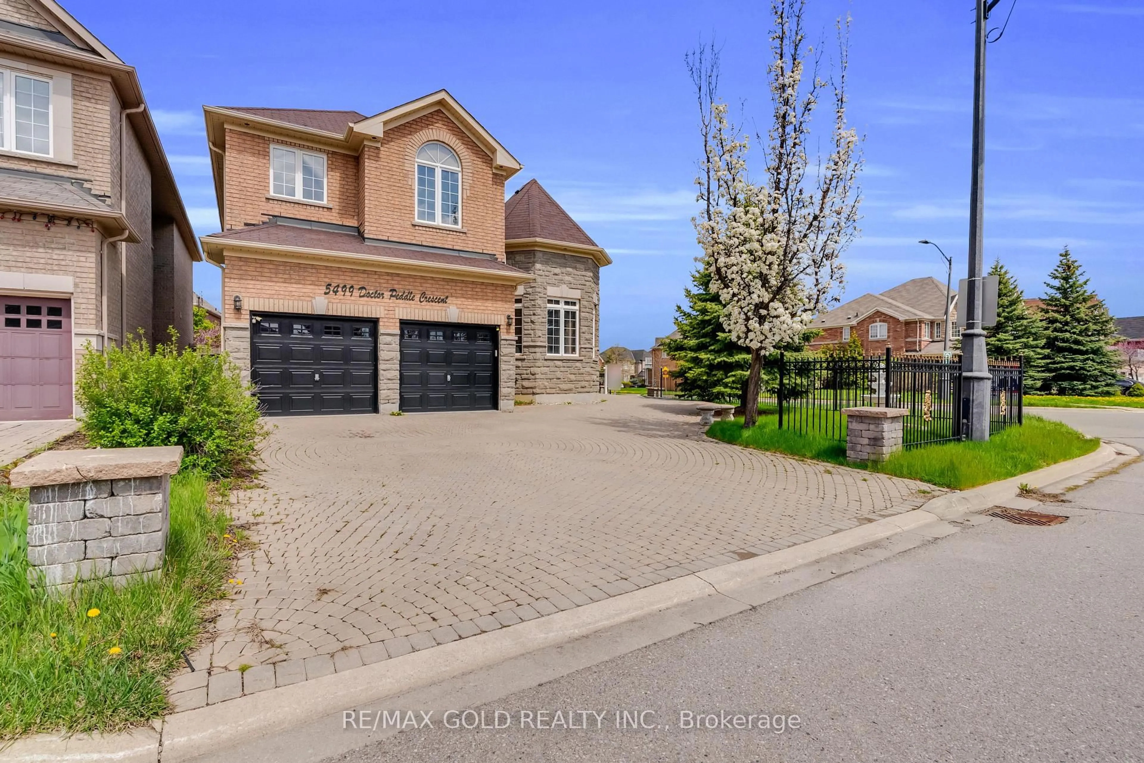 Home with brick exterior material, street for 5499 Doctor Peddle Cres, Mississauga Ontario L5M 0K7