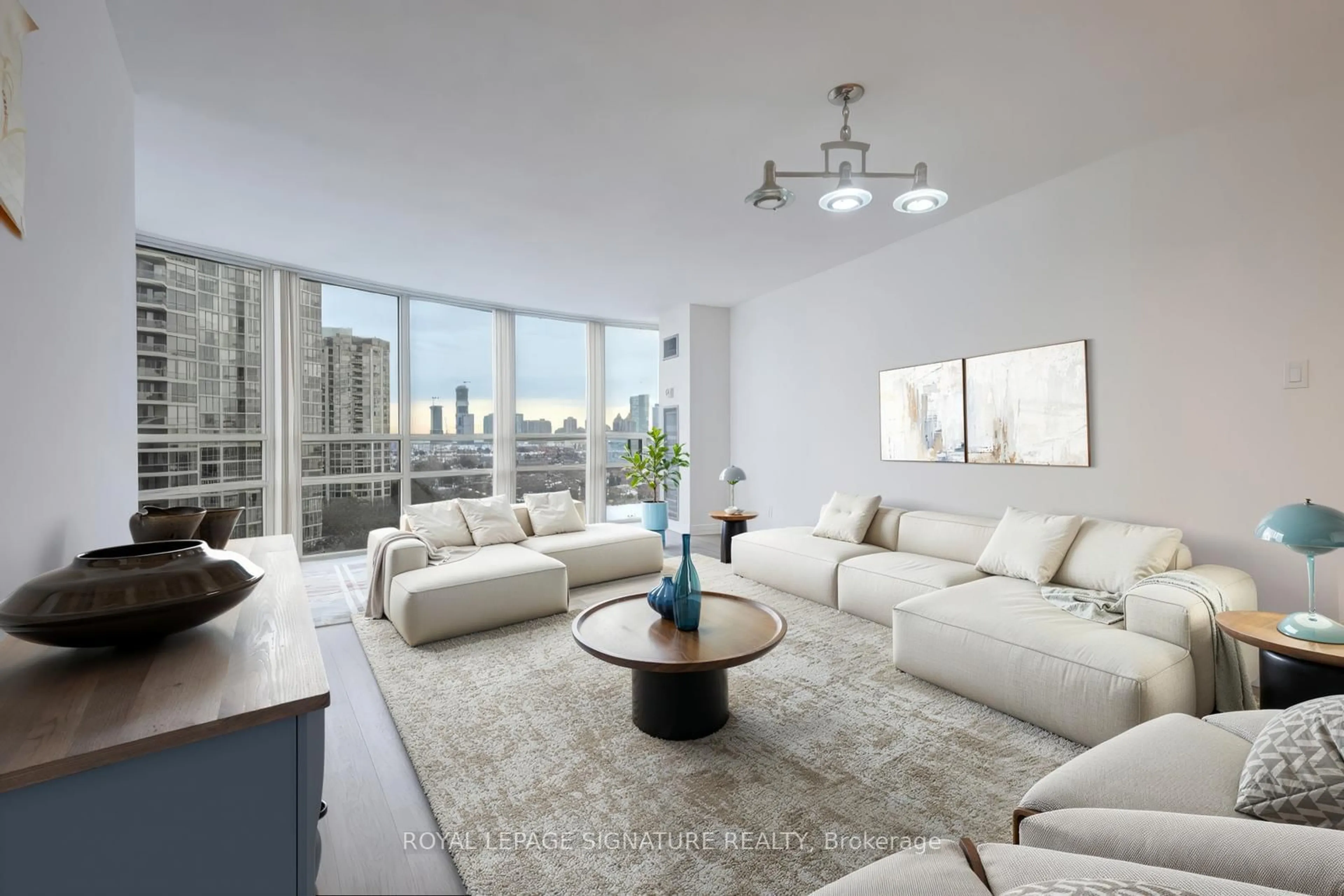 Living room with furniture, unknown for 50 Eglinton Ave #1106, Mississauga Ontario L5R 3P5