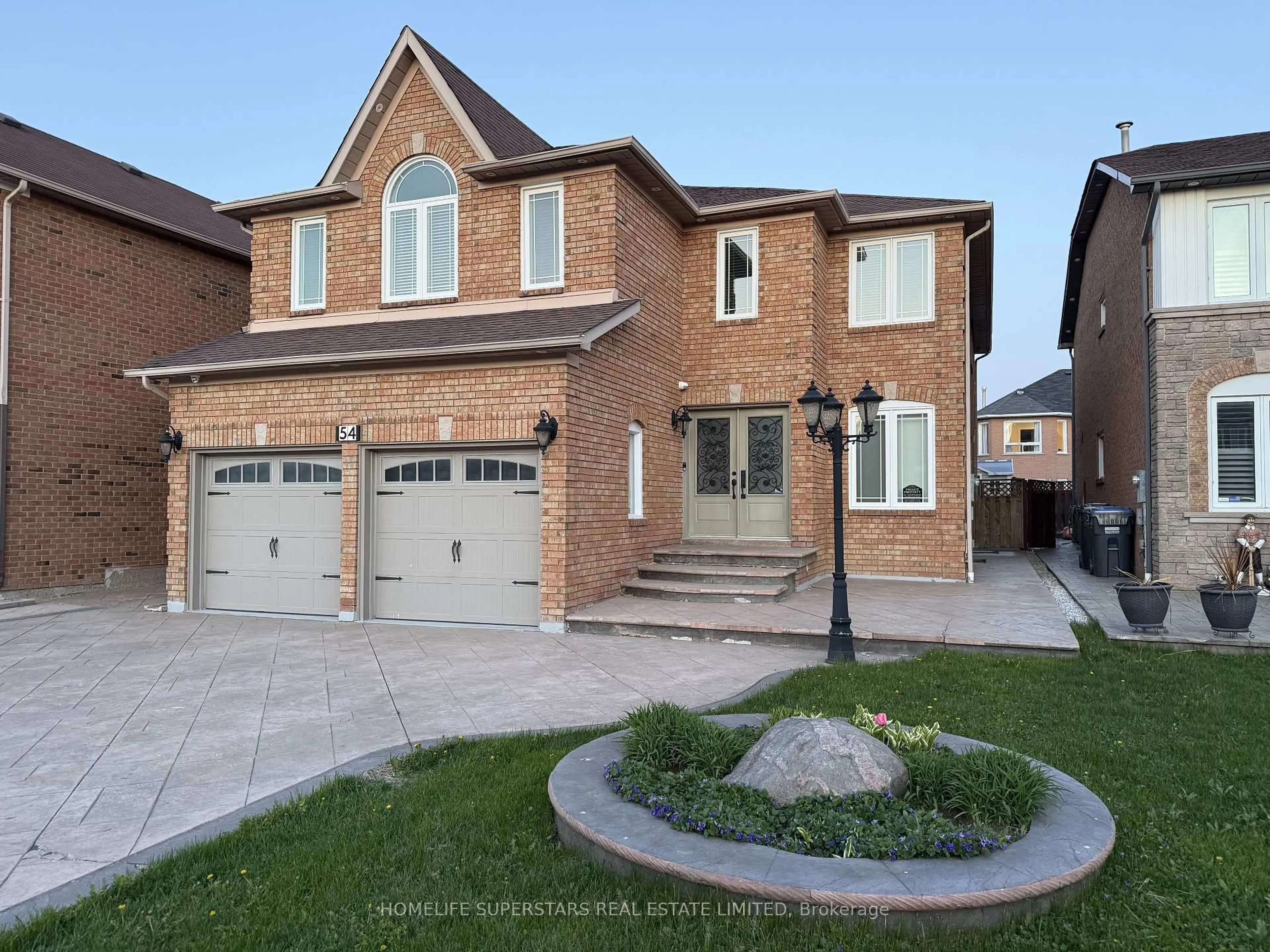 Home with brick exterior material, street for 54 Hollybush St, Brampton Ontario L6R 1A6