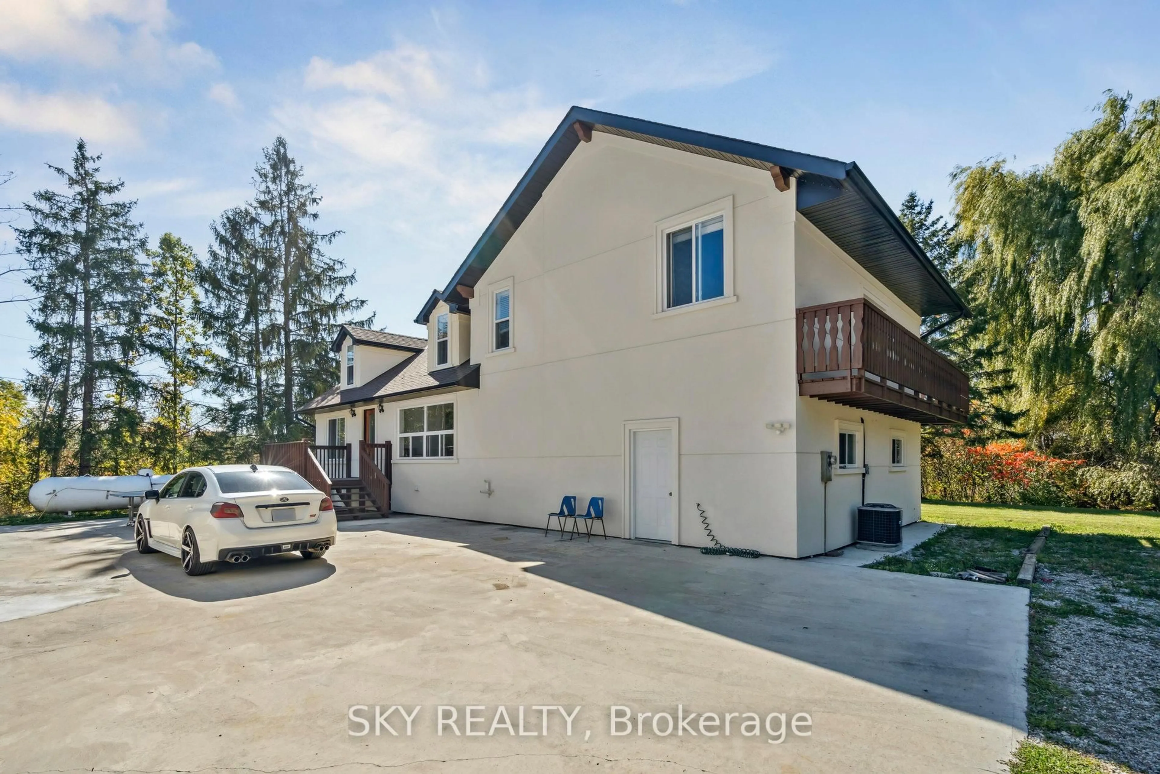 A pic from outside/outdoor area/front of a property/back of a property/a pic from drone, street for 12478 5 Line, Halton Hills Ontario L0P 1H0