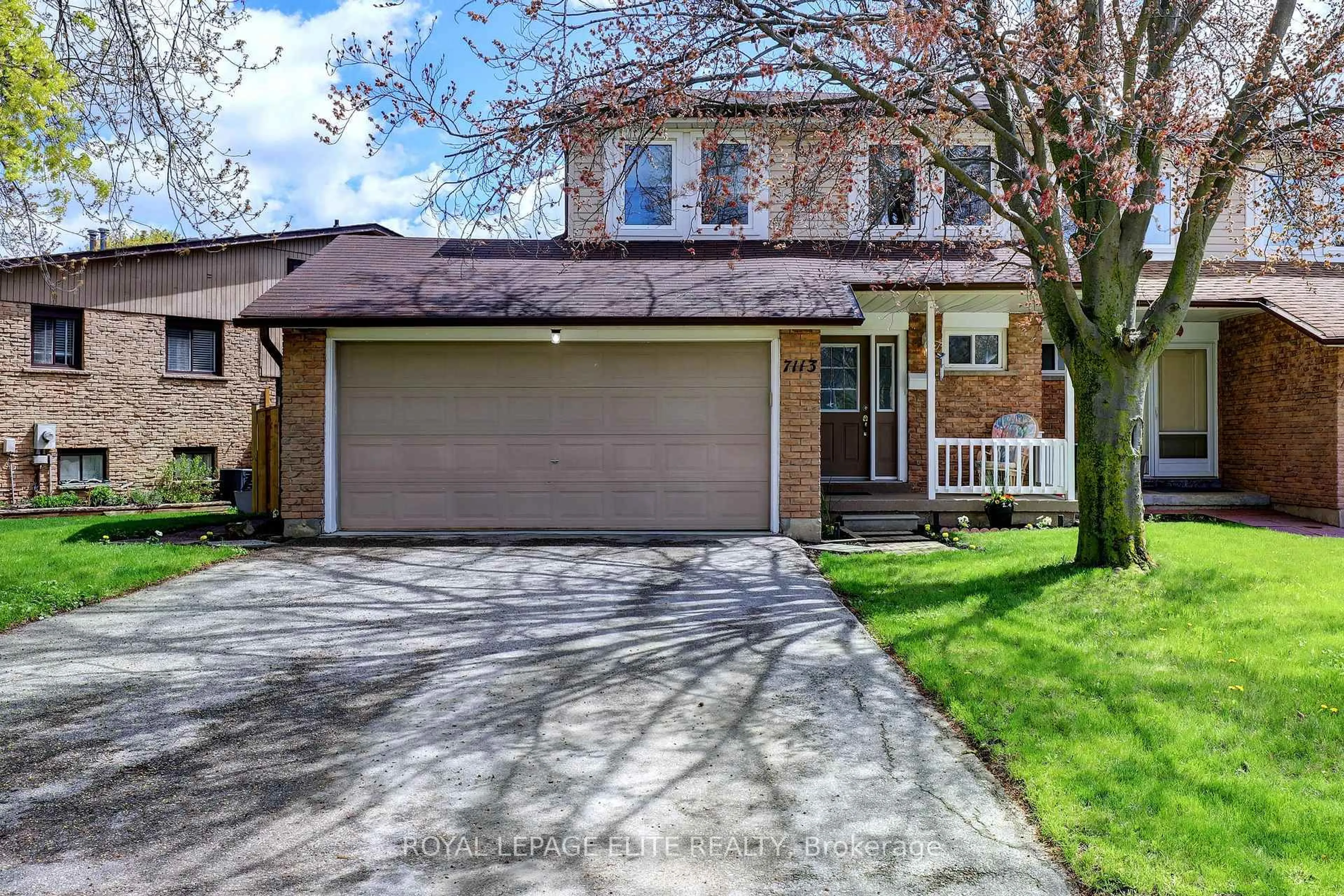 Home with vinyl exterior material, street for 7113 Tamar Rd, Mississauga Ontario L5N 1Y7