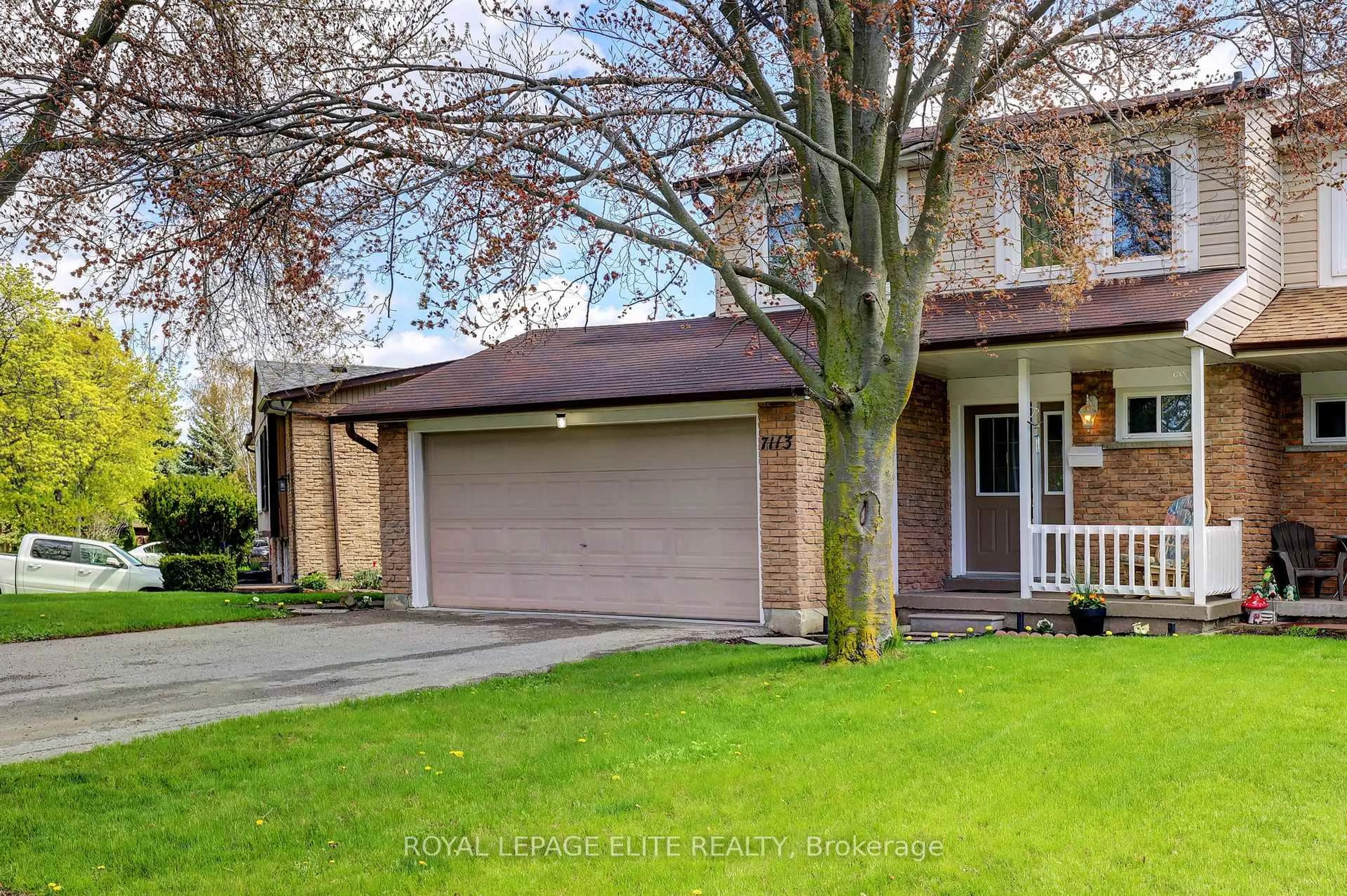 Home with brick exterior material, street for 7113 Tamar Rd, Mississauga Ontario L5N 1Y7