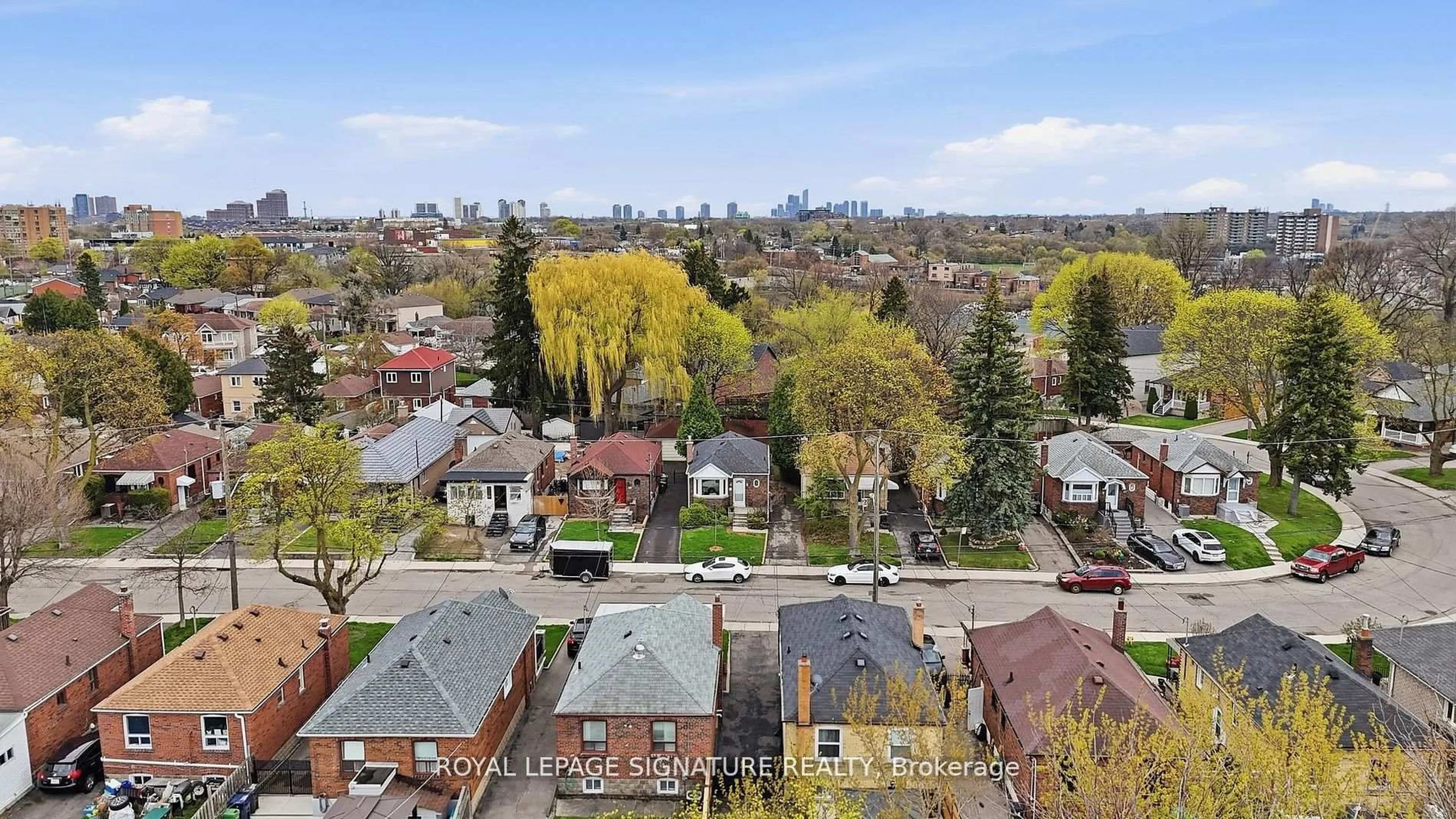 A pic from outside/outdoor area/front of a property/back of a property/a pic from drone, city buildings view from balcony for 53 Juliet Cres, Toronto Ontario M6M 1N5