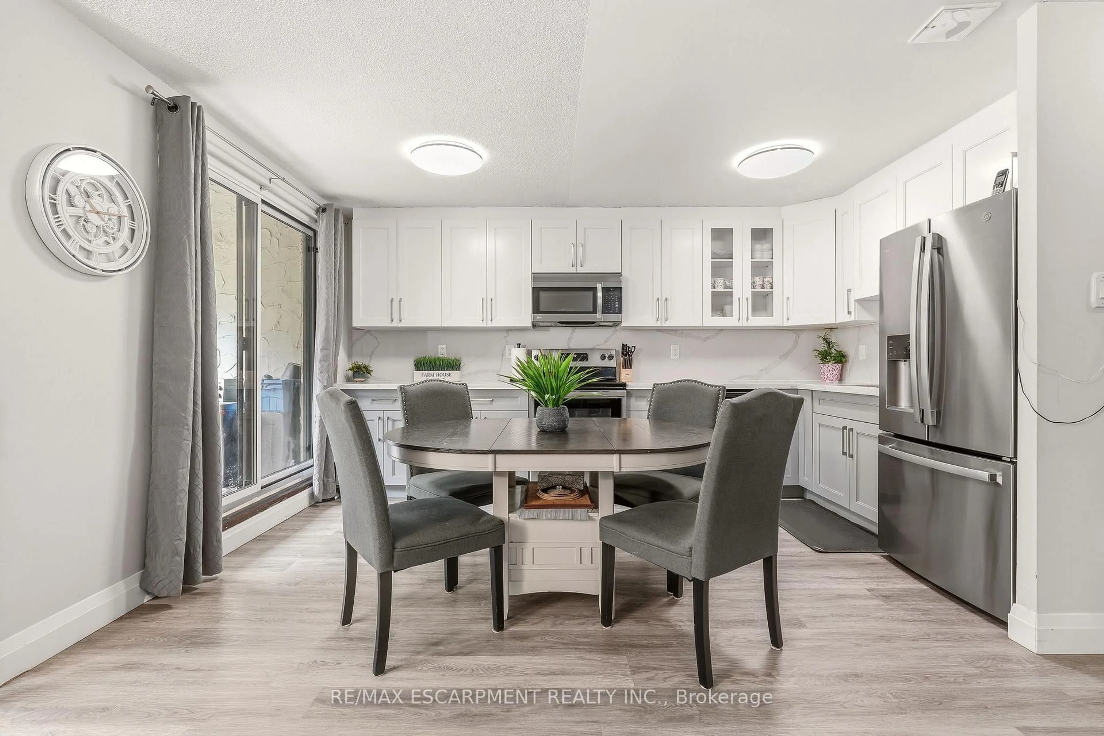 Open concept kitchen, unknown for 1066 Falgarwood Dr #154, Oakville Ontario L6H 2P3