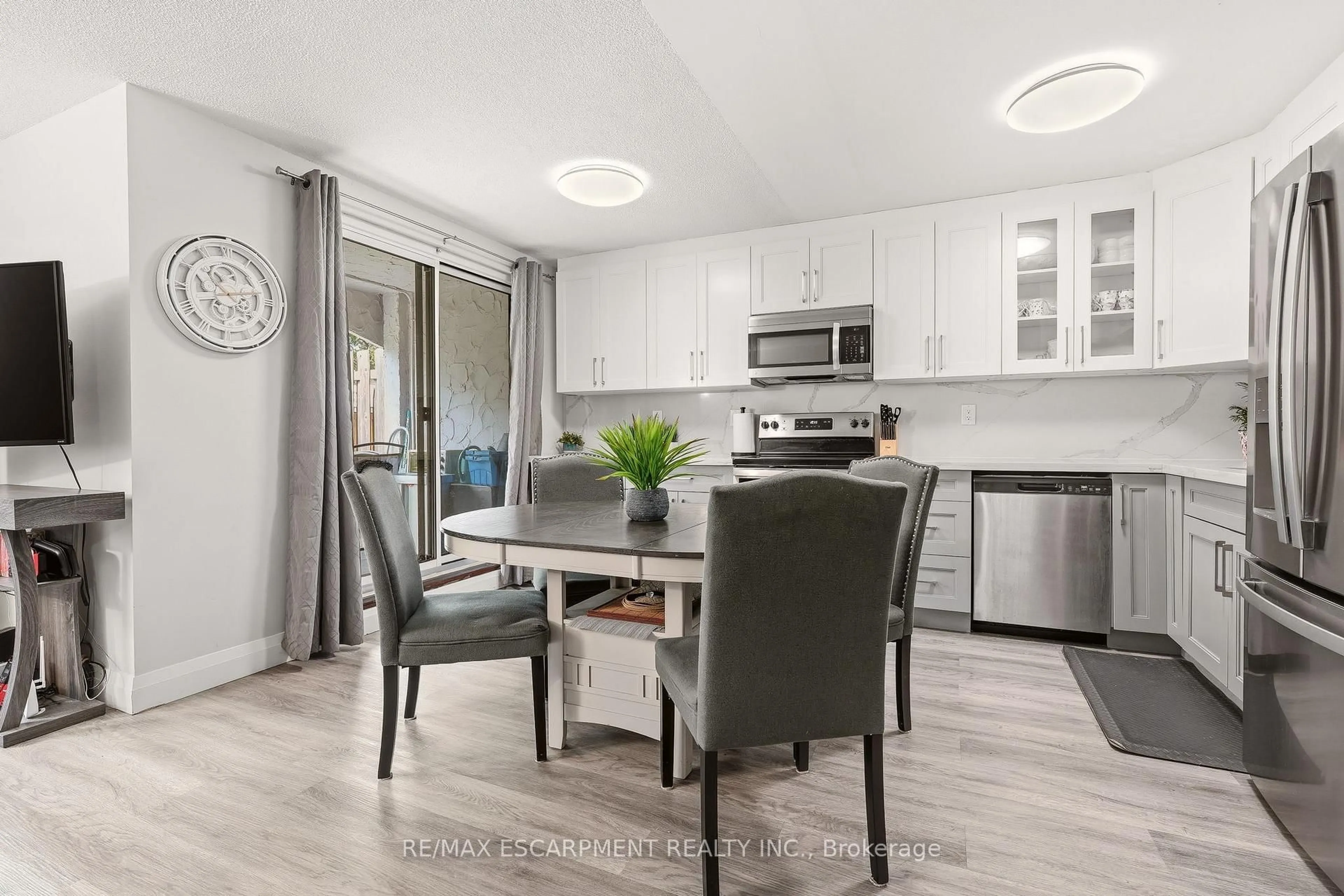 Open concept kitchen, unknown for 1066 Falgarwood Dr #154, Oakville Ontario L6H 2P3