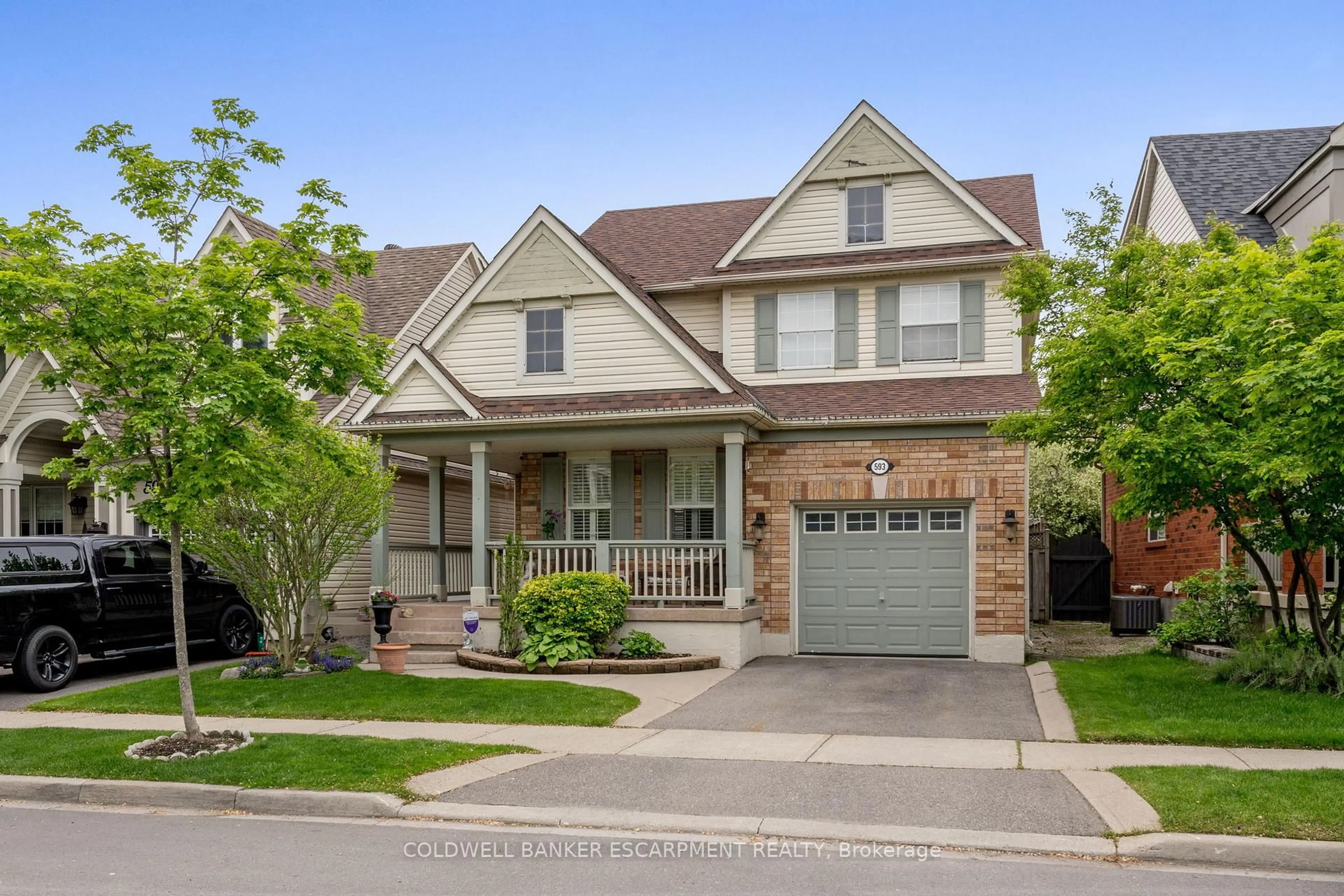 Home with brick exterior material, street for 593 Caverhill Cres, Milton Ontario L9T 5K1