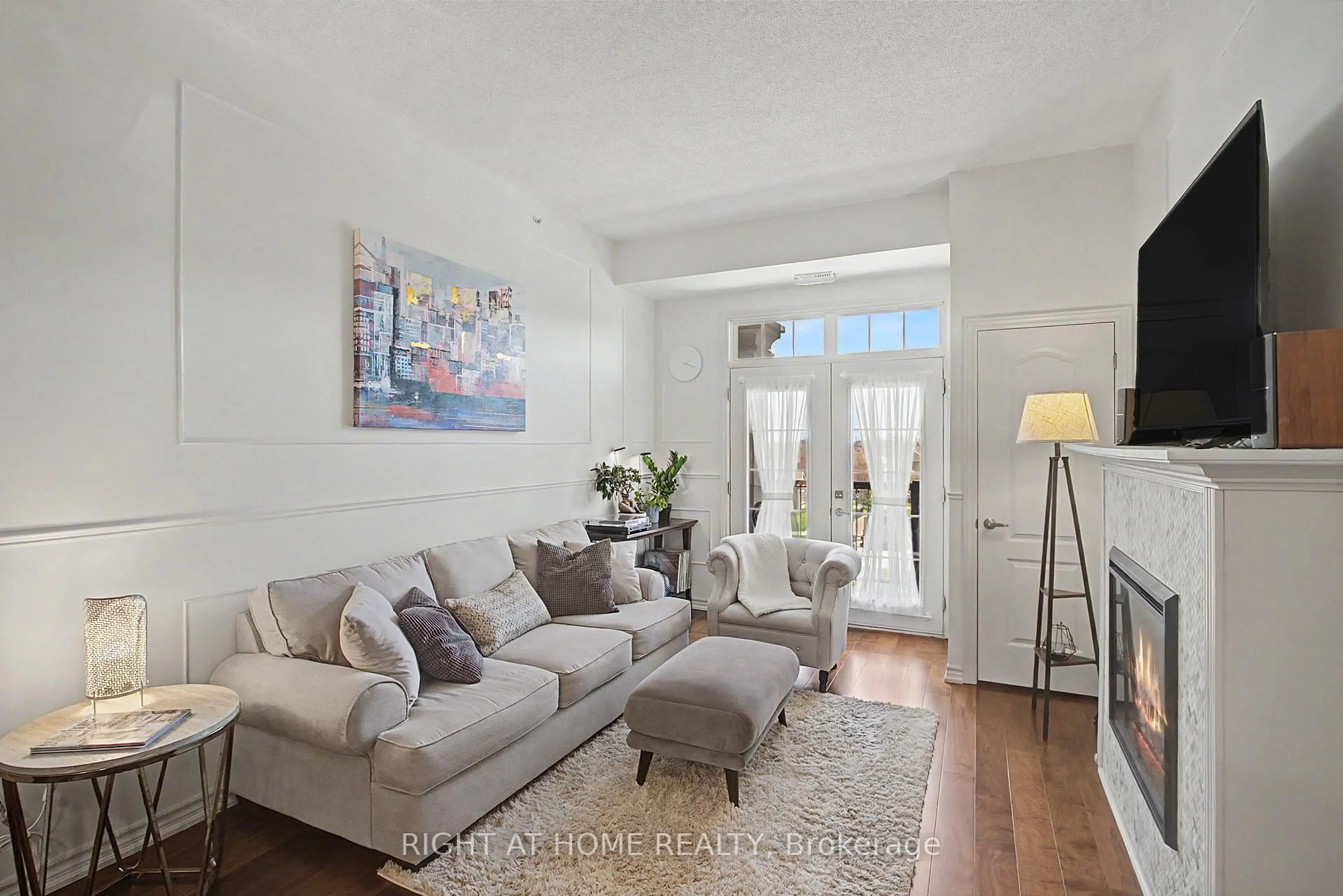 Living room with furniture, unknown for 1460 Main St #404, Milton Ontario L9T 8W5