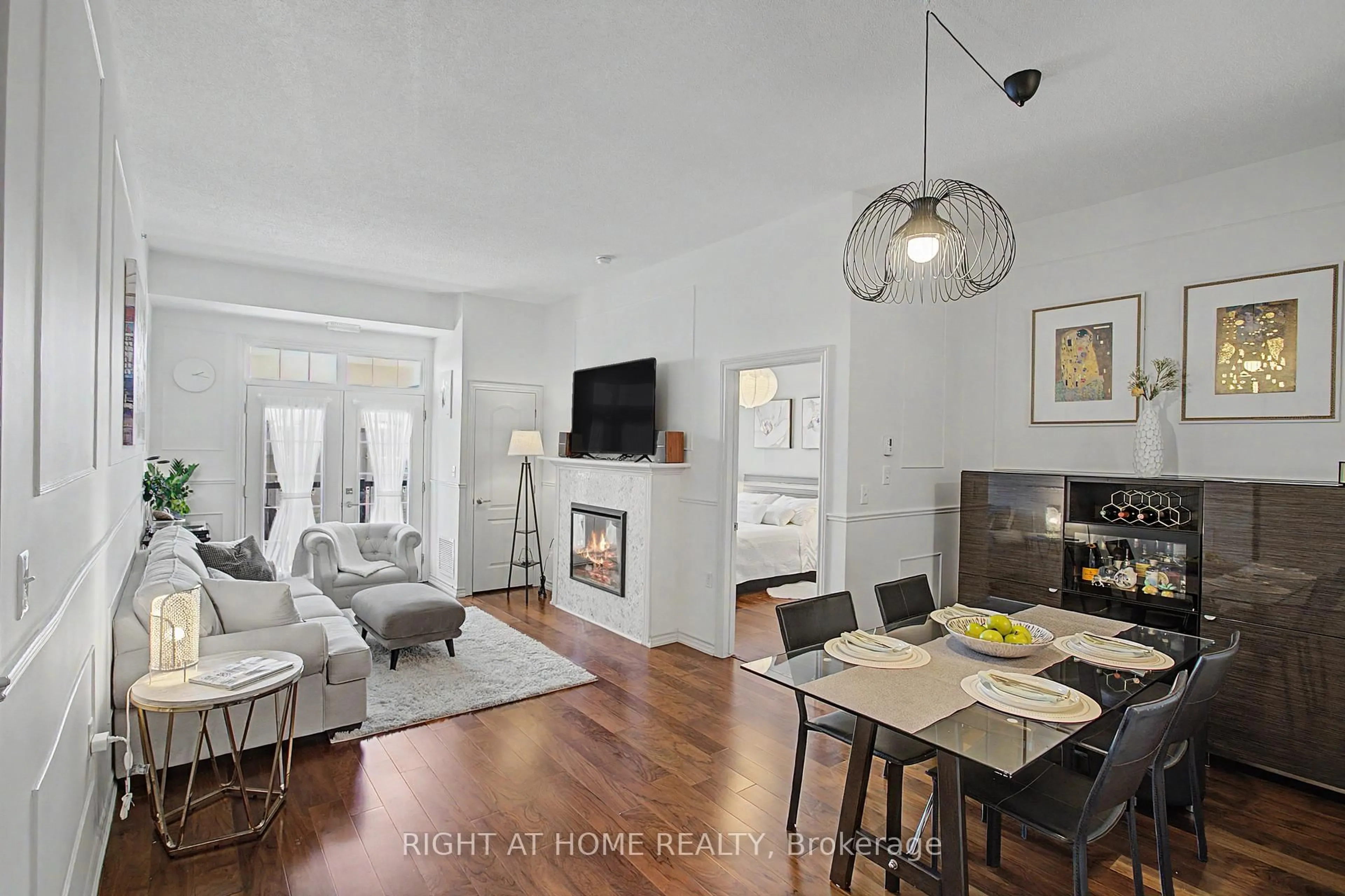 Living room with furniture, unknown for 1460 Main St #404, Milton Ontario L9T 8W5