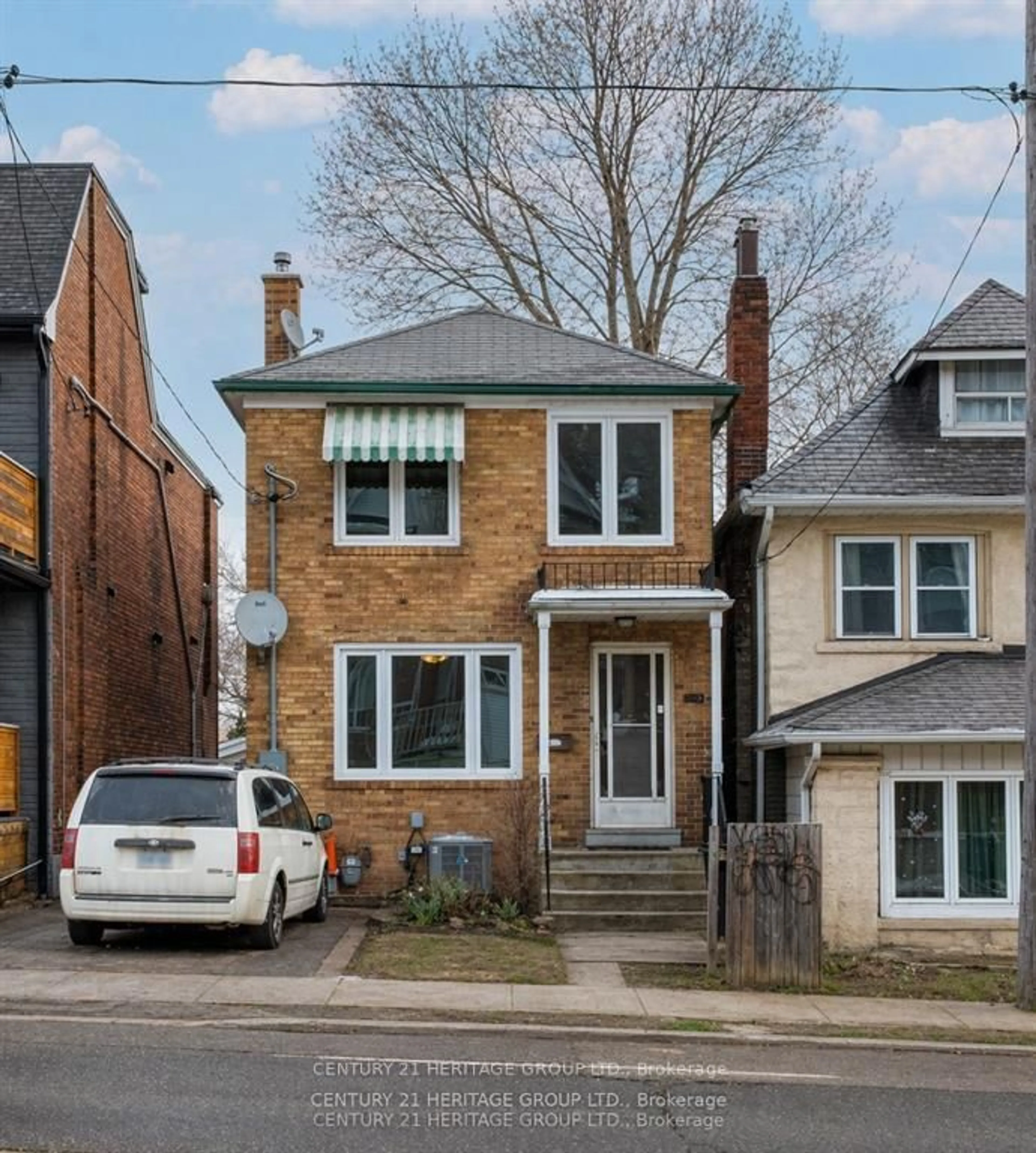 Home with brick exterior material, street for 215 Keele St, Toronto Ontario M6P 2K1