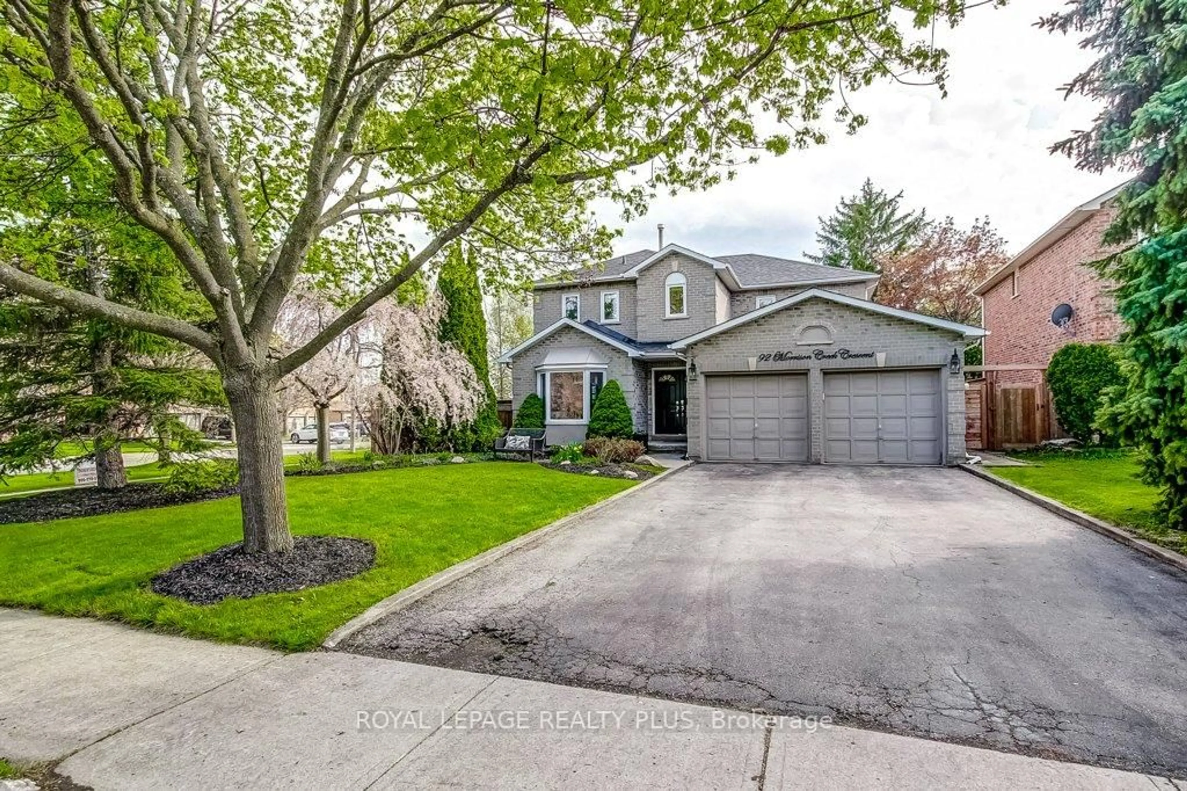 Home with brick exterior material, street for 92 Morrison Creek Cres, Oakville Ontario L6H 4C4