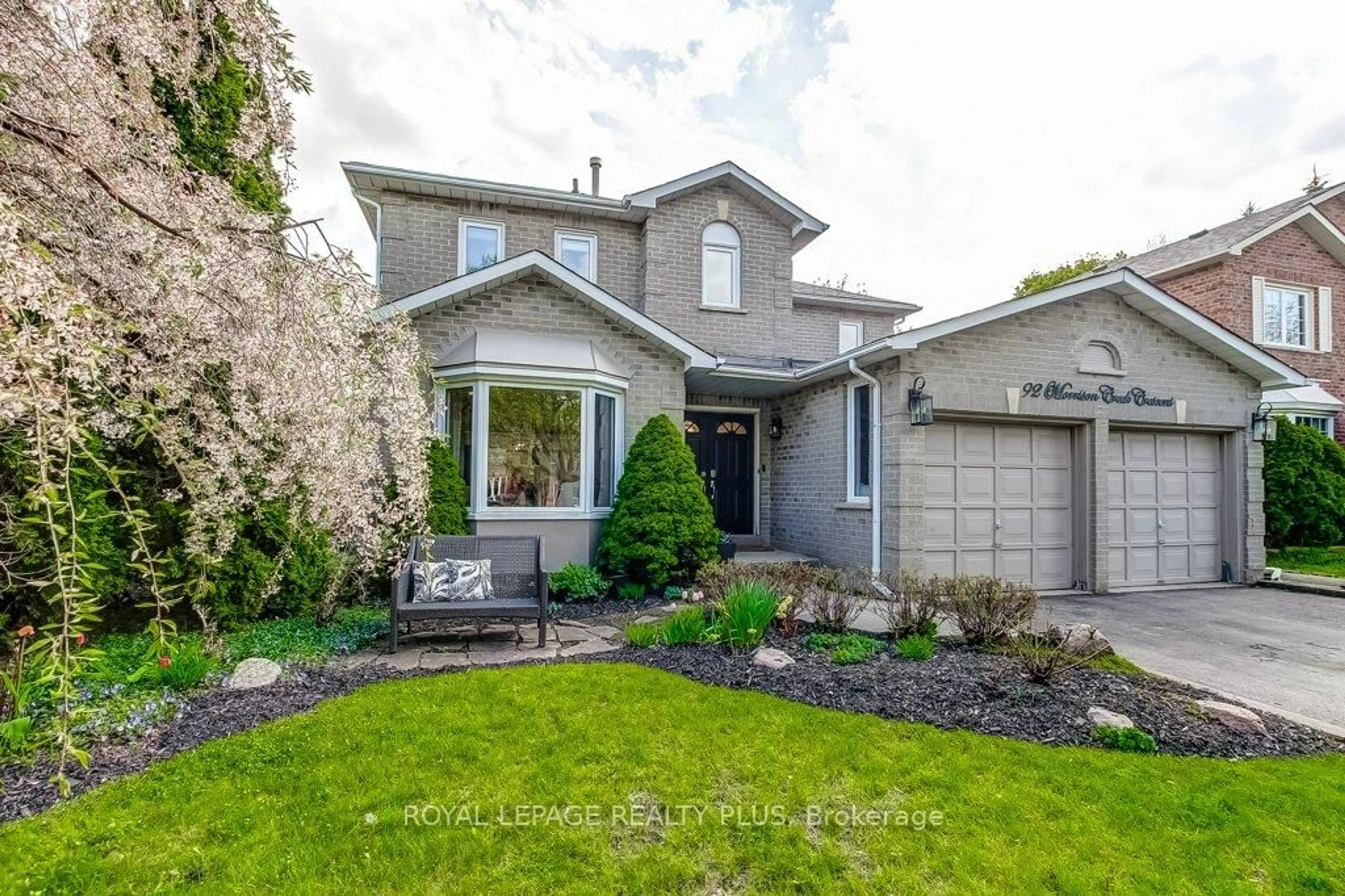 Home with brick exterior material, street for 92 Morrison Creek Cres, Oakville Ontario L6H 4C4
