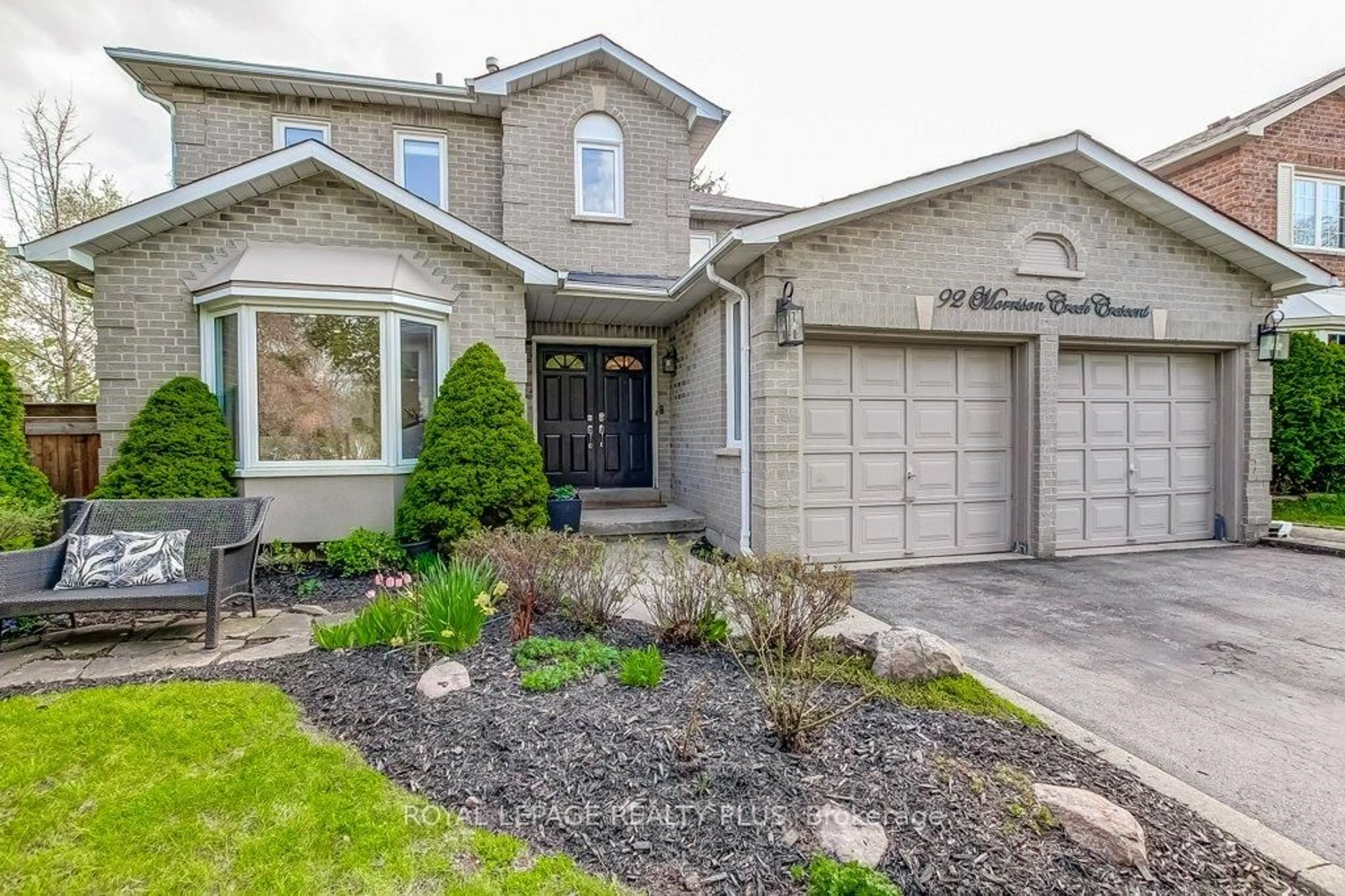 Home with brick exterior material, street for 92 Morrison Creek Cres, Oakville Ontario L6H 4C4
