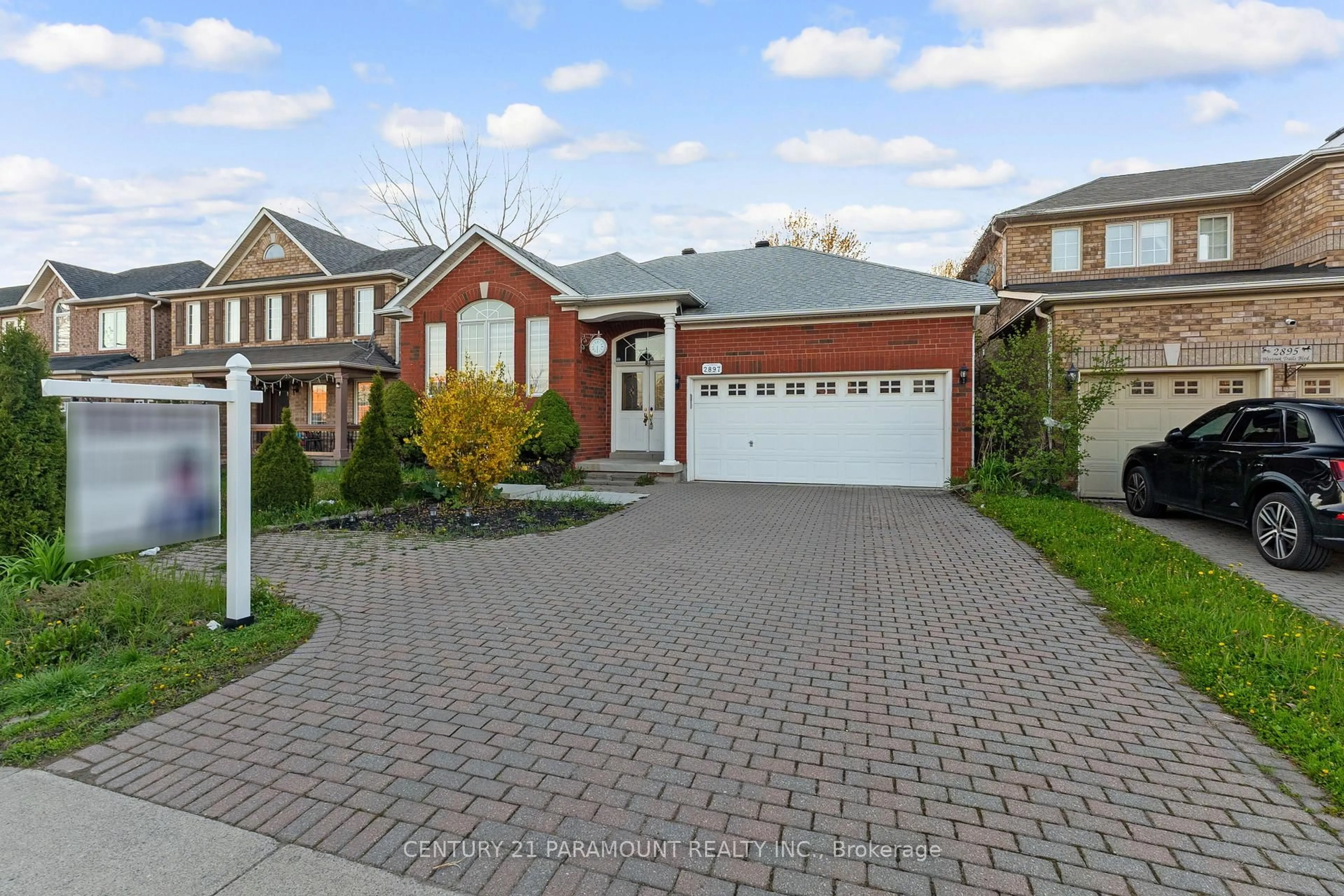 Home with brick exterior material, street for 2897 Westoak Trails Blvd, Oakville Ontario L6M 4V2